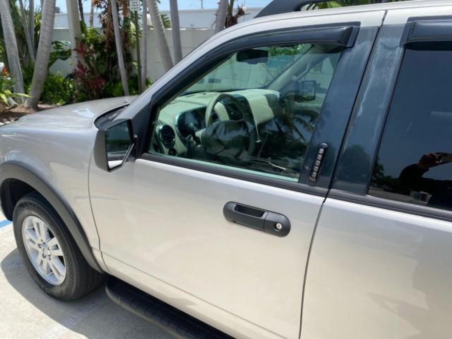 2007 Mineral Grey Metallic /Camel Ford Explorer Sport Trac XLT LOW MILES 80,420 (1FMEU31K37U) with an 4.0L SOHC 12-Valve V6 Engine engine, Automatic transmission, located at 4701 North Dixie Hwy, Pompano Beach, FL, 33064, (954) 422-2889, 26.240938, -80.123474 - OUR WEBPAGE FLORIDACARS1.COM HAS OVER 100 PHOTOS AND FREE CARFAX LINK 2007 FORD EXPLORER SPORT TRAC XLT TIRES LOOK GREAT! VIN: 1FMEU31K37UA56699 1 F M E U 3 1 K 3 7 U A 5 6 6 9 9 SPORT PICKUP 4.0L V6 F SOHC GASOLINE REAR WHEEL DRIVE Top Features Alloy Wheels Running Boards Bed Cover Tow Hitch Cloth - Photo#27