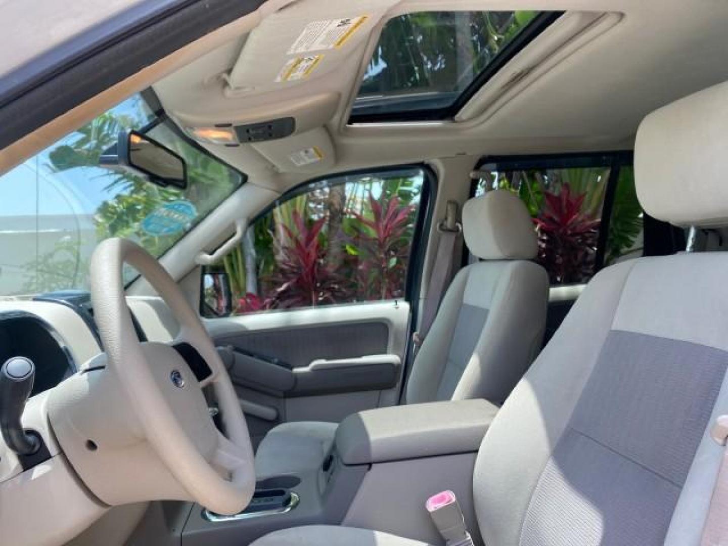 2007 Mineral Grey Metallic /Camel Ford Explorer Sport Trac XLT LOW MILES 80,420 (1FMEU31K37U) with an 4.0L SOHC 12-Valve V6 Engine engine, Automatic transmission, located at 4701 North Dixie Hwy, Pompano Beach, FL, 33064, (954) 422-2889, 26.240938, -80.123474 - OUR WEBPAGE FLORIDACARS1.COM HAS OVER 100 PHOTOS AND FREE CARFAX LINK 2007 FORD EXPLORER SPORT TRAC XLT TIRES LOOK GREAT! VIN: 1FMEU31K37UA56699 1 F M E U 3 1 K 3 7 U A 5 6 6 9 9 SPORT PICKUP 4.0L V6 F SOHC GASOLINE REAR WHEEL DRIVE Top Features Alloy Wheels Running Boards Bed Cover Tow Hitch Cloth - Photo#34