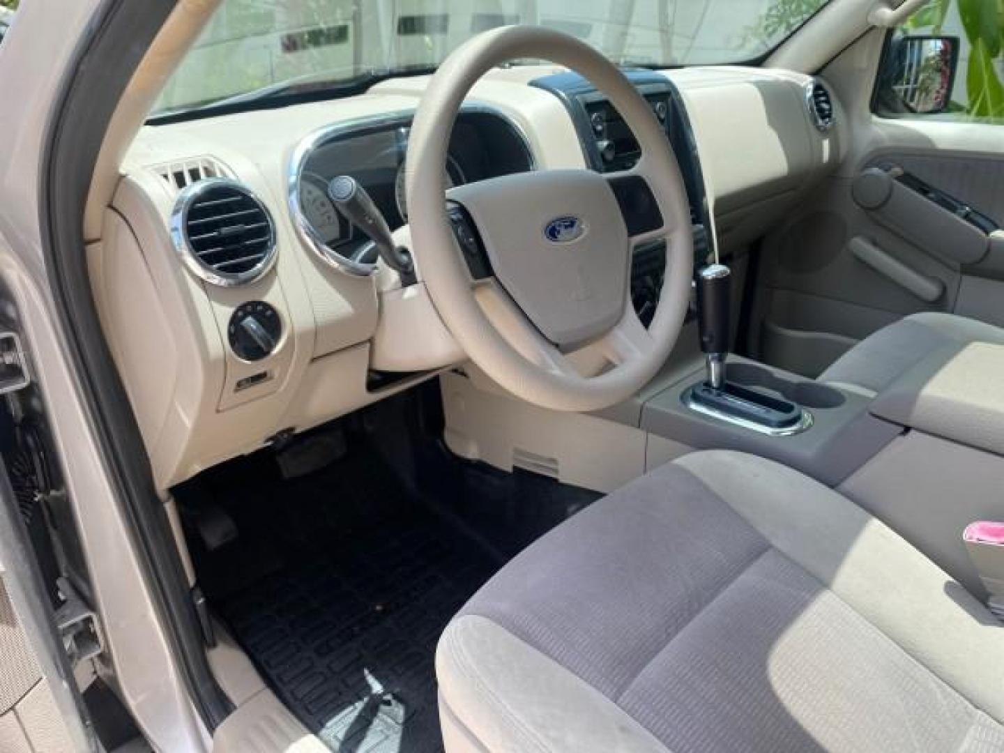 2007 Mineral Grey Metallic /Camel Ford Explorer Sport Trac XLT LOW MILES 80,420 (1FMEU31K37U) with an 4.0L SOHC 12-Valve V6 Engine engine, Automatic transmission, located at 4701 North Dixie Hwy, Pompano Beach, FL, 33064, (954) 422-2889, 26.240938, -80.123474 - OUR WEBPAGE FLORIDACARS1.COM HAS OVER 100 PHOTOS AND FREE CARFAX LINK 2007 FORD EXPLORER SPORT TRAC XLT TIRES LOOK GREAT! VIN: 1FMEU31K37UA56699 1 F M E U 3 1 K 3 7 U A 5 6 6 9 9 SPORT PICKUP 4.0L V6 F SOHC GASOLINE REAR WHEEL DRIVE Top Features Alloy Wheels Running Boards Bed Cover Tow Hitch Cloth - Photo#37