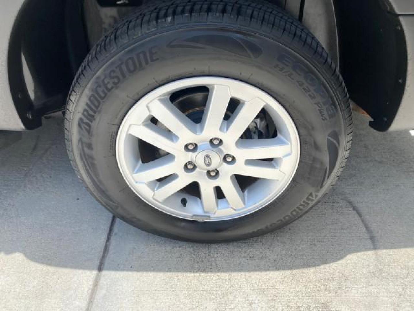 2007 Mineral Grey Metallic /Camel Ford Explorer Sport Trac XLT LOW MILES 80,420 (1FMEU31K37U) with an 4.0L SOHC 12-Valve V6 Engine engine, Automatic transmission, located at 4701 North Dixie Hwy, Pompano Beach, FL, 33064, (954) 422-2889, 26.240938, -80.123474 - OUR WEBPAGE FLORIDACARS1.COM HAS OVER 100 PHOTOS AND FREE CARFAX LINK 2007 FORD EXPLORER SPORT TRAC XLT TIRES LOOK GREAT! VIN: 1FMEU31K37UA56699 1 F M E U 3 1 K 3 7 U A 5 6 6 9 9 SPORT PICKUP 4.0L V6 F SOHC GASOLINE REAR WHEEL DRIVE Top Features Alloy Wheels Running Boards Bed Cover Tow Hitch Cloth - Photo#64
