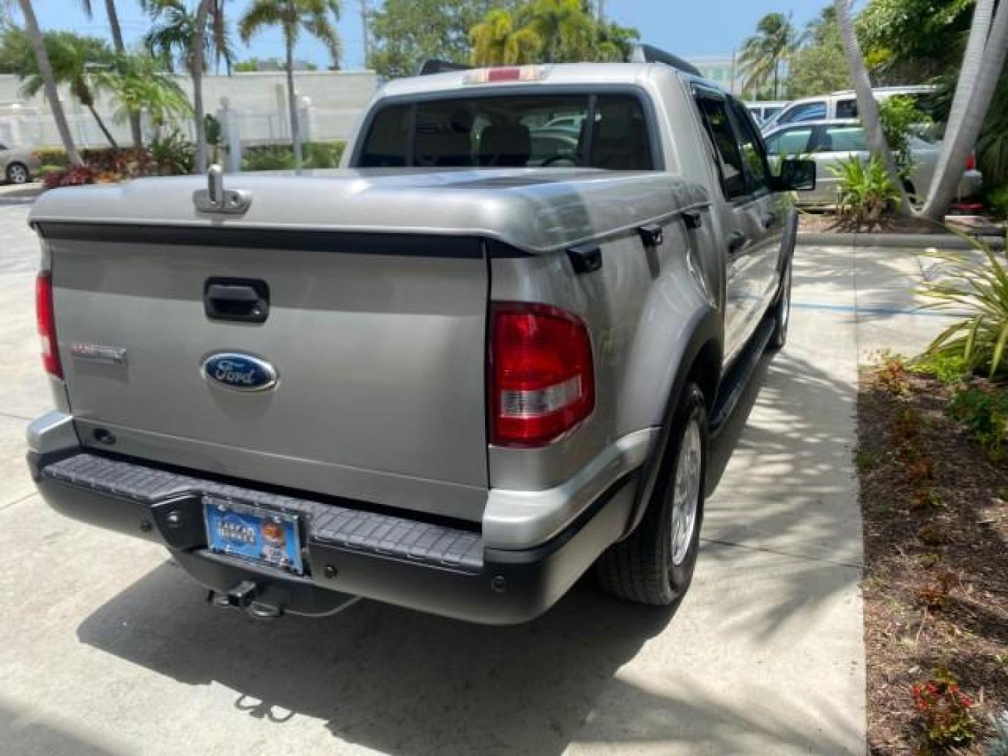2007 Mineral Grey Metallic /Camel Ford Explorer Sport Trac XLT LOW MILES 80,420 (1FMEU31K37U) with an 4.0L SOHC 12-Valve V6 Engine engine, Automatic transmission, located at 4701 North Dixie Hwy, Pompano Beach, FL, 33064, (954) 422-2889, 26.240938, -80.123474 - OUR WEBPAGE FLORIDACARS1.COM HAS OVER 100 PHOTOS AND FREE CARFAX LINK 2007 FORD EXPLORER SPORT TRAC XLT TIRES LOOK GREAT! VIN: 1FMEU31K37UA56699 1 F M E U 3 1 K 3 7 U A 5 6 6 9 9 SPORT PICKUP 4.0L V6 F SOHC GASOLINE REAR WHEEL DRIVE Top Features Alloy Wheels Running Boards Bed Cover Tow Hitch Cloth - Photo#69