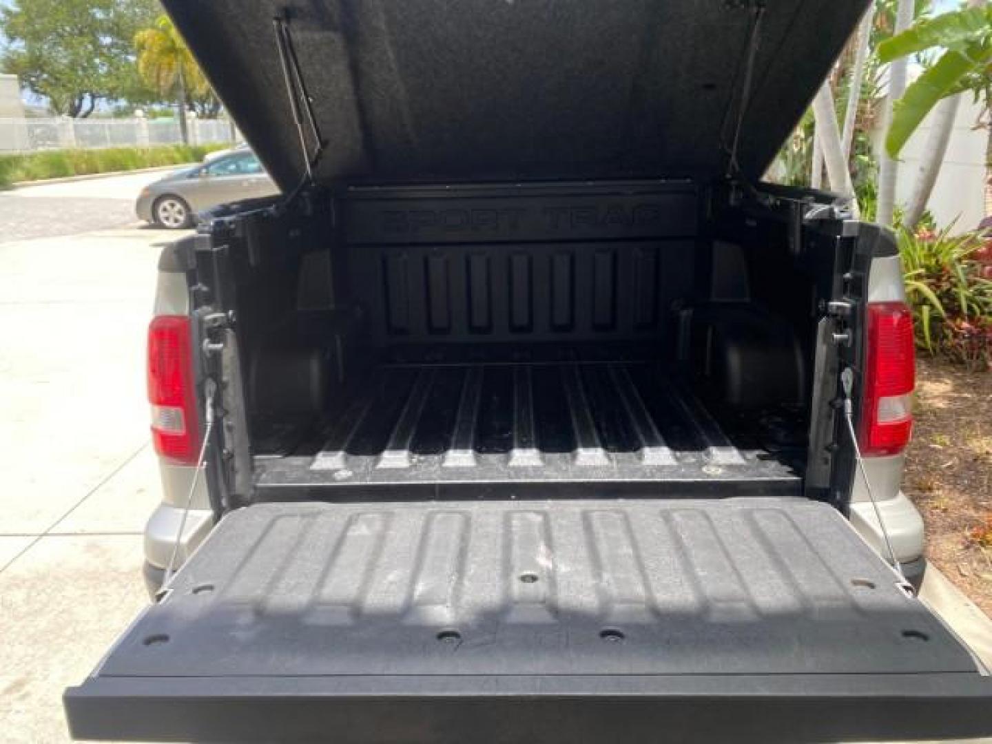 2007 Mineral Grey Metallic /Camel Ford Explorer Sport Trac XLT LOW MILES 80,420 (1FMEU31K37U) with an 4.0L SOHC 12-Valve V6 Engine engine, Automatic transmission, located at 4701 North Dixie Hwy, Pompano Beach, FL, 33064, (954) 422-2889, 26.240938, -80.123474 - OUR WEBPAGE FLORIDACARS1.COM HAS OVER 100 PHOTOS AND FREE CARFAX LINK 2007 FORD EXPLORER SPORT TRAC XLT TIRES LOOK GREAT! VIN: 1FMEU31K37UA56699 1 F M E U 3 1 K 3 7 U A 5 6 6 9 9 SPORT PICKUP 4.0L V6 F SOHC GASOLINE REAR WHEEL DRIVE Top Features Alloy Wheels Running Boards Bed Cover Tow Hitch Cloth - Photo#71