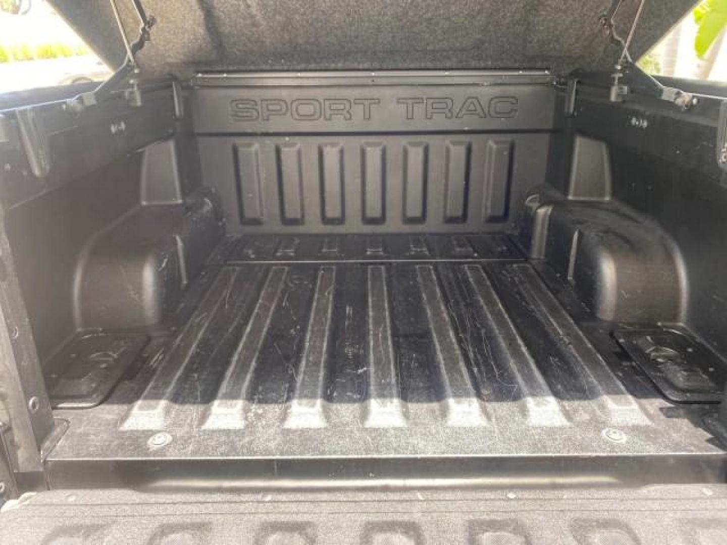 2007 Mineral Grey Metallic /Camel Ford Explorer Sport Trac XLT LOW MILES 80,420 (1FMEU31K37U) with an 4.0L SOHC 12-Valve V6 Engine engine, Automatic transmission, located at 4701 North Dixie Hwy, Pompano Beach, FL, 33064, (954) 422-2889, 26.240938, -80.123474 - OUR WEBPAGE FLORIDACARS1.COM HAS OVER 100 PHOTOS AND FREE CARFAX LINK 2007 FORD EXPLORER SPORT TRAC XLT TIRES LOOK GREAT! VIN: 1FMEU31K37UA56699 1 F M E U 3 1 K 3 7 U A 5 6 6 9 9 SPORT PICKUP 4.0L V6 F SOHC GASOLINE REAR WHEEL DRIVE Top Features Alloy Wheels Running Boards Bed Cover Tow Hitch Cloth - Photo#72