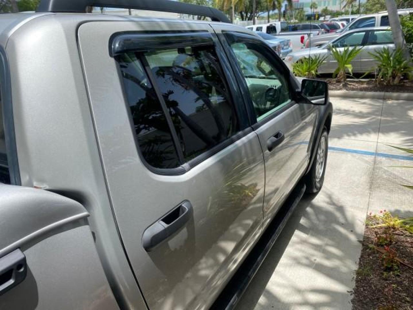 2007 Mineral Grey Metallic /Camel Ford Explorer Sport Trac XLT LOW MILES 80,420 (1FMEU31K37U) with an 4.0L SOHC 12-Valve V6 Engine engine, Automatic transmission, located at 4701 North Dixie Hwy, Pompano Beach, FL, 33064, (954) 422-2889, 26.240938, -80.123474 - OUR WEBPAGE FLORIDACARS1.COM HAS OVER 100 PHOTOS AND FREE CARFAX LINK 2007 FORD EXPLORER SPORT TRAC XLT TIRES LOOK GREAT! VIN: 1FMEU31K37UA56699 1 F M E U 3 1 K 3 7 U A 5 6 6 9 9 SPORT PICKUP 4.0L V6 F SOHC GASOLINE REAR WHEEL DRIVE Top Features Alloy Wheels Running Boards Bed Cover Tow Hitch Cloth - Photo#79