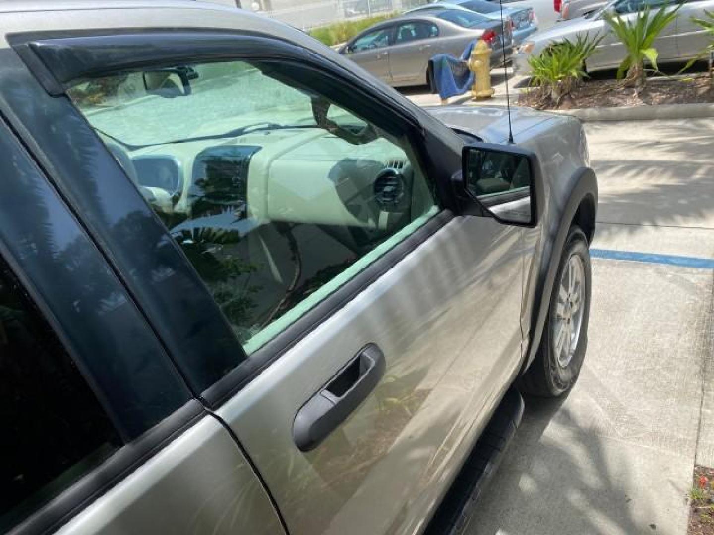 2007 Mineral Grey Metallic /Camel Ford Explorer Sport Trac XLT LOW MILES 80,420 (1FMEU31K37U) with an 4.0L SOHC 12-Valve V6 Engine engine, Automatic transmission, located at 4701 North Dixie Hwy, Pompano Beach, FL, 33064, (954) 422-2889, 26.240938, -80.123474 - OUR WEBPAGE FLORIDACARS1.COM HAS OVER 100 PHOTOS AND FREE CARFAX LINK 2007 FORD EXPLORER SPORT TRAC XLT TIRES LOOK GREAT! VIN: 1FMEU31K37UA56699 1 F M E U 3 1 K 3 7 U A 5 6 6 9 9 SPORT PICKUP 4.0L V6 F SOHC GASOLINE REAR WHEEL DRIVE Top Features Alloy Wheels Running Boards Bed Cover Tow Hitch Cloth - Photo#88