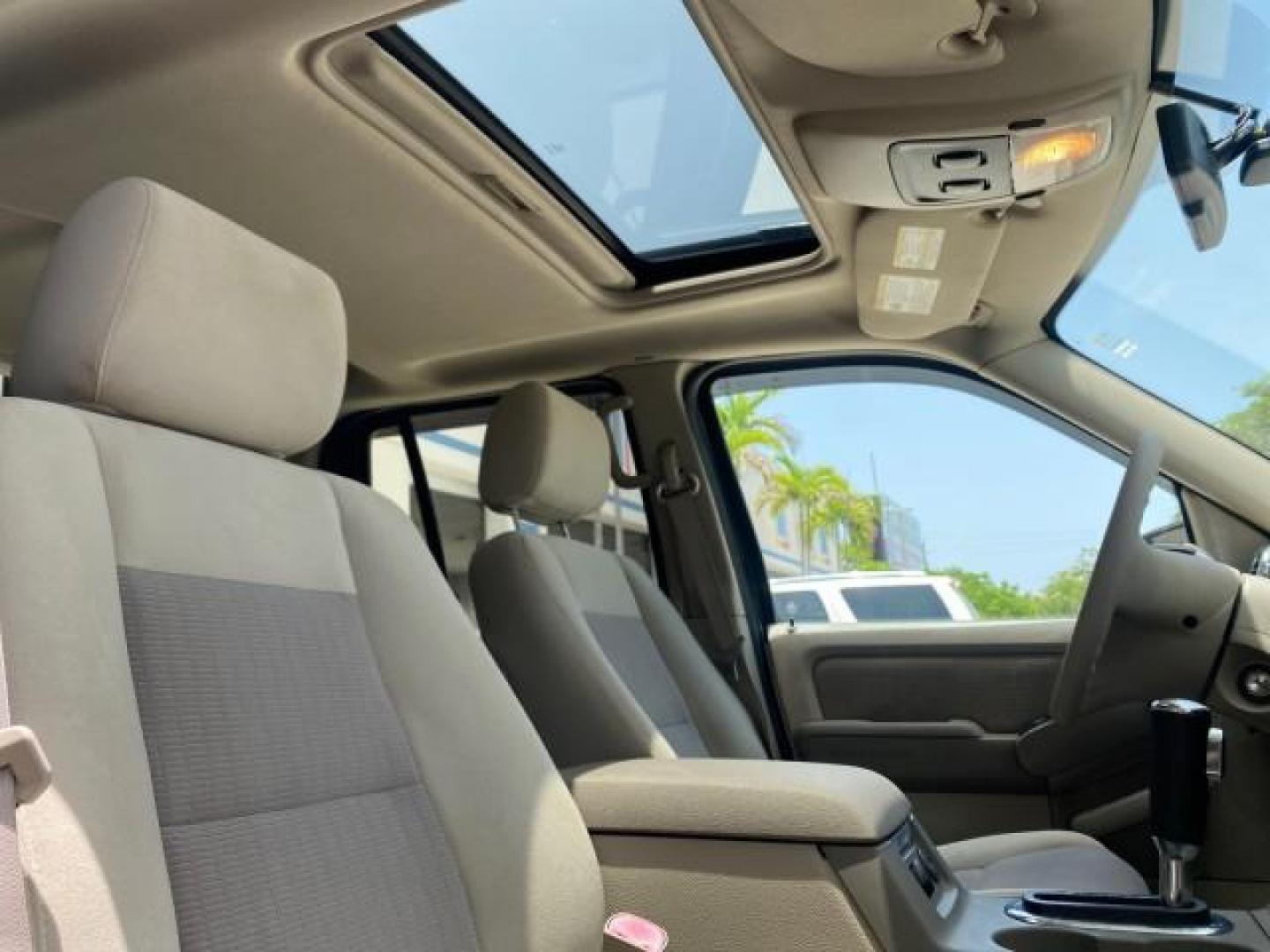 2007 Mineral Grey Metallic /Camel Ford Explorer Sport Trac XLT LOW MILES 80,420 (1FMEU31K37U) with an 4.0L SOHC 12-Valve V6 Engine engine, Automatic transmission, located at 4701 North Dixie Hwy, Pompano Beach, FL, 33064, (954) 422-2889, 26.240938, -80.123474 - OUR WEBPAGE FLORIDACARS1.COM HAS OVER 100 PHOTOS AND FREE CARFAX LINK 2007 FORD EXPLORER SPORT TRAC XLT TIRES LOOK GREAT! VIN: 1FMEU31K37UA56699 1 F M E U 3 1 K 3 7 U A 5 6 6 9 9 SPORT PICKUP 4.0L V6 F SOHC GASOLINE REAR WHEEL DRIVE Top Features Alloy Wheels Running Boards Bed Cover Tow Hitch Cloth - Photo#91
