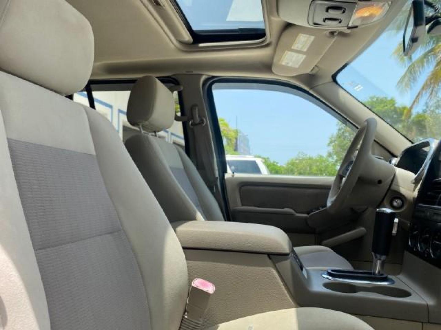 2007 Mineral Grey Metallic /Camel Ford Explorer Sport Trac XLT LOW MILES 80,420 (1FMEU31K37U) with an 4.0L SOHC 12-Valve V6 Engine engine, Automatic transmission, located at 4701 North Dixie Hwy, Pompano Beach, FL, 33064, (954) 422-2889, 26.240938, -80.123474 - OUR WEBPAGE FLORIDACARS1.COM HAS OVER 100 PHOTOS AND FREE CARFAX LINK 2007 FORD EXPLORER SPORT TRAC XLT TIRES LOOK GREAT! VIN: 1FMEU31K37UA56699 1 F M E U 3 1 K 3 7 U A 5 6 6 9 9 SPORT PICKUP 4.0L V6 F SOHC GASOLINE REAR WHEEL DRIVE Top Features Alloy Wheels Running Boards Bed Cover Tow Hitch Cloth - Photo#92