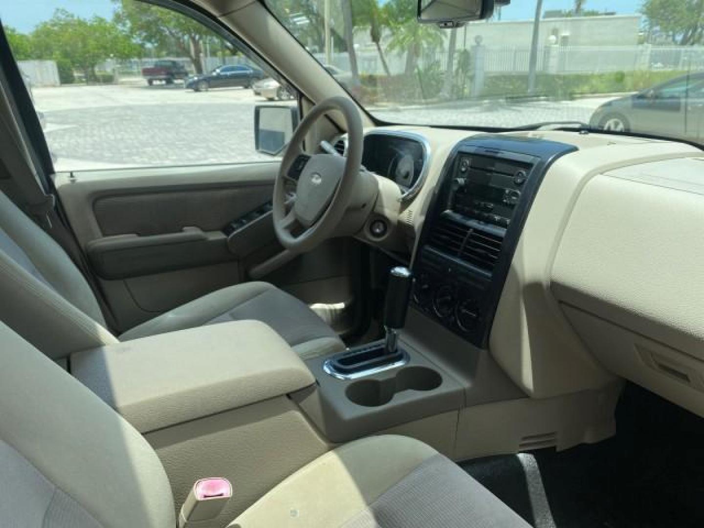 2007 Mineral Grey Metallic /Camel Ford Explorer Sport Trac XLT LOW MILES 80,420 (1FMEU31K37U) with an 4.0L SOHC 12-Valve V6 Engine engine, Automatic transmission, located at 4701 North Dixie Hwy, Pompano Beach, FL, 33064, (954) 422-2889, 26.240938, -80.123474 - OUR WEBPAGE FLORIDACARS1.COM HAS OVER 100 PHOTOS AND FREE CARFAX LINK 2007 FORD EXPLORER SPORT TRAC XLT TIRES LOOK GREAT! VIN: 1FMEU31K37UA56699 1 F M E U 3 1 K 3 7 U A 5 6 6 9 9 SPORT PICKUP 4.0L V6 F SOHC GASOLINE REAR WHEEL DRIVE Top Features Alloy Wheels Running Boards Bed Cover Tow Hitch Cloth - Photo#94