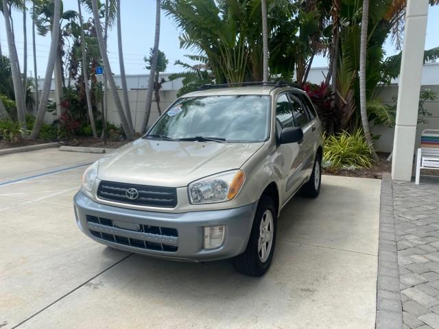 2002 Titanium /Gray Toyota RAV4 1 OWNER FL LOW MILES 83,089 (JTEGH20V020) with an 2.0L DOHC EFI 16-Valve 4-Cyl Engine engine, Automatic transmission, located at 4701 North Dixie Hwy, Pompano Beach, FL, 33064, (954) 422-2889, 26.240938, -80.123474 - OUR WEBPAGE FLORIDACARS1.COM HAS OVER 100 PHOTOS AND FREE CARFAX LINK 2002 TOYOTA RAV4 VIN: JTEGH20V020080431 J T E G H 2 0 V 0 2 0 0 8 0 4 3 1 4 DOOR WAGON/SPORT UTILITY 2.0L I4 F DOHC 16V GASOLINE FRONT WHEEL DRIVE Top Features Cloth Seats Basic Features AM/FM Stereo CD Audio Full Roof Rack Power - Photo#3