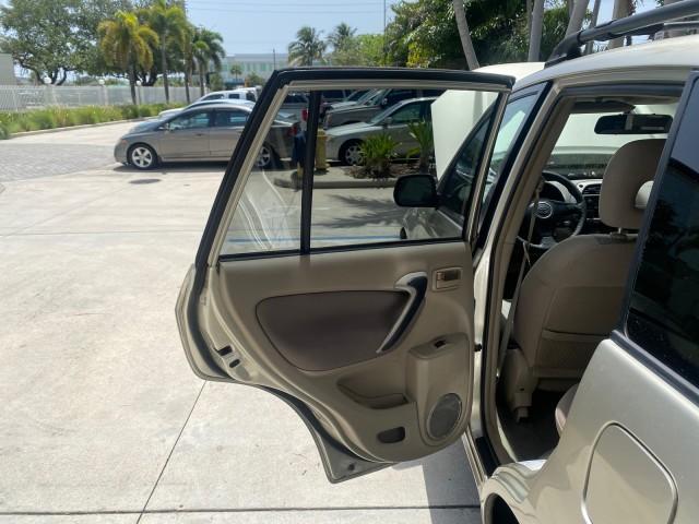 2002 Titanium /Gray Toyota RAV4 1 OWNER FL LOW MILES 83,089 (JTEGH20V020) with an 2.0L DOHC EFI 16-Valve 4-Cyl Engine engine, Automatic transmission, located at 4701 North Dixie Hwy, Pompano Beach, FL, 33064, (954) 422-2889, 26.240938, -80.123474 - OUR WEBPAGE FLORIDACARS1.COM HAS OVER 100 PHOTOS AND FREE CARFAX LINK 2002 TOYOTA RAV4 VIN: JTEGH20V020080431 J T E G H 2 0 V 0 2 0 0 8 0 4 3 1 4 DOOR WAGON/SPORT UTILITY 2.0L I4 F DOHC 16V GASOLINE FRONT WHEEL DRIVE Top Features Cloth Seats Basic Features AM/FM Stereo CD Audio Full Roof Rack Power - Photo#13