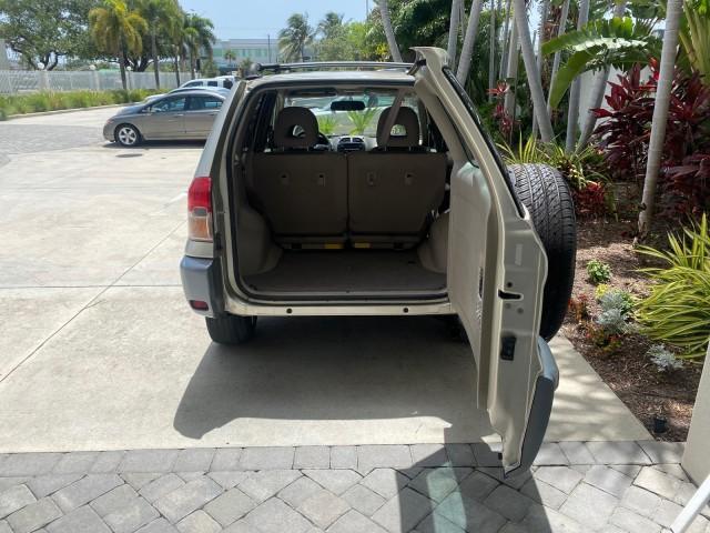 2002 Titanium /Gray Toyota RAV4 1 OWNER FL LOW MILES 83,089 (JTEGH20V020) with an 2.0L DOHC EFI 16-Valve 4-Cyl Engine engine, Automatic transmission, located at 4701 North Dixie Hwy, Pompano Beach, FL, 33064, (954) 422-2889, 26.240938, -80.123474 - OUR WEBPAGE FLORIDACARS1.COM HAS OVER 100 PHOTOS AND FREE CARFAX LINK 2002 TOYOTA RAV4 VIN: JTEGH20V020080431 J T E G H 2 0 V 0 2 0 0 8 0 4 3 1 4 DOOR WAGON/SPORT UTILITY 2.0L I4 F DOHC 16V GASOLINE FRONT WHEEL DRIVE Top Features Cloth Seats Basic Features AM/FM Stereo CD Audio Full Roof Rack Power - Photo#77
