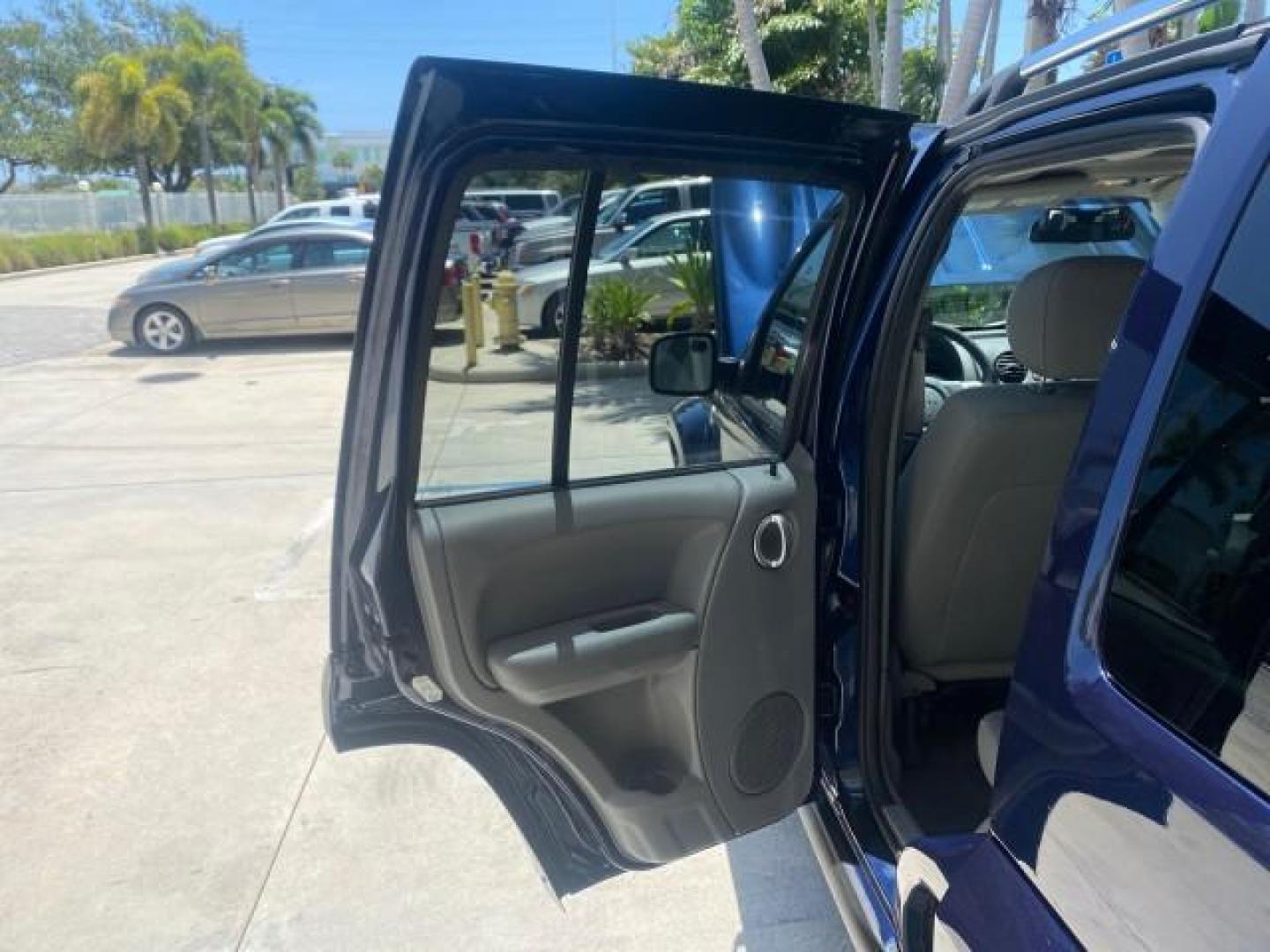 2006 Patriot Blue Pearl /Med Slate Gray Jeep Liberty 4WD Limited LOW MILES 75,404 (1J4GL58K16W) with an 3.7L V6 Engine engine, Automatic transmission, located at 4701 North Dixie Hwy, Pompano Beach, FL, 33064, (954) 422-2889, 26.240938, -80.123474 - OUR WEBPAGE FLORIDACARS1.COM HAS OVER 100 PHOTOS AND FREE CARFAX LINK 2006 JEEP LIBERTY LIMITED VIN: 1J4GL58K16W148375 1 J 4 G L 5 8 K 1 6 W 1 4 8 3 7 5 4 DOOR WAGON/SPORT UTILITY 3.7L V6 F GASOLINE REAR WHEEL DRIVE W/ 4X4 Top Features 4WD/AWD Sunroof(s) Alloy Wheels Tow Hitch Cloth Seats Basic Feat - Photo#13