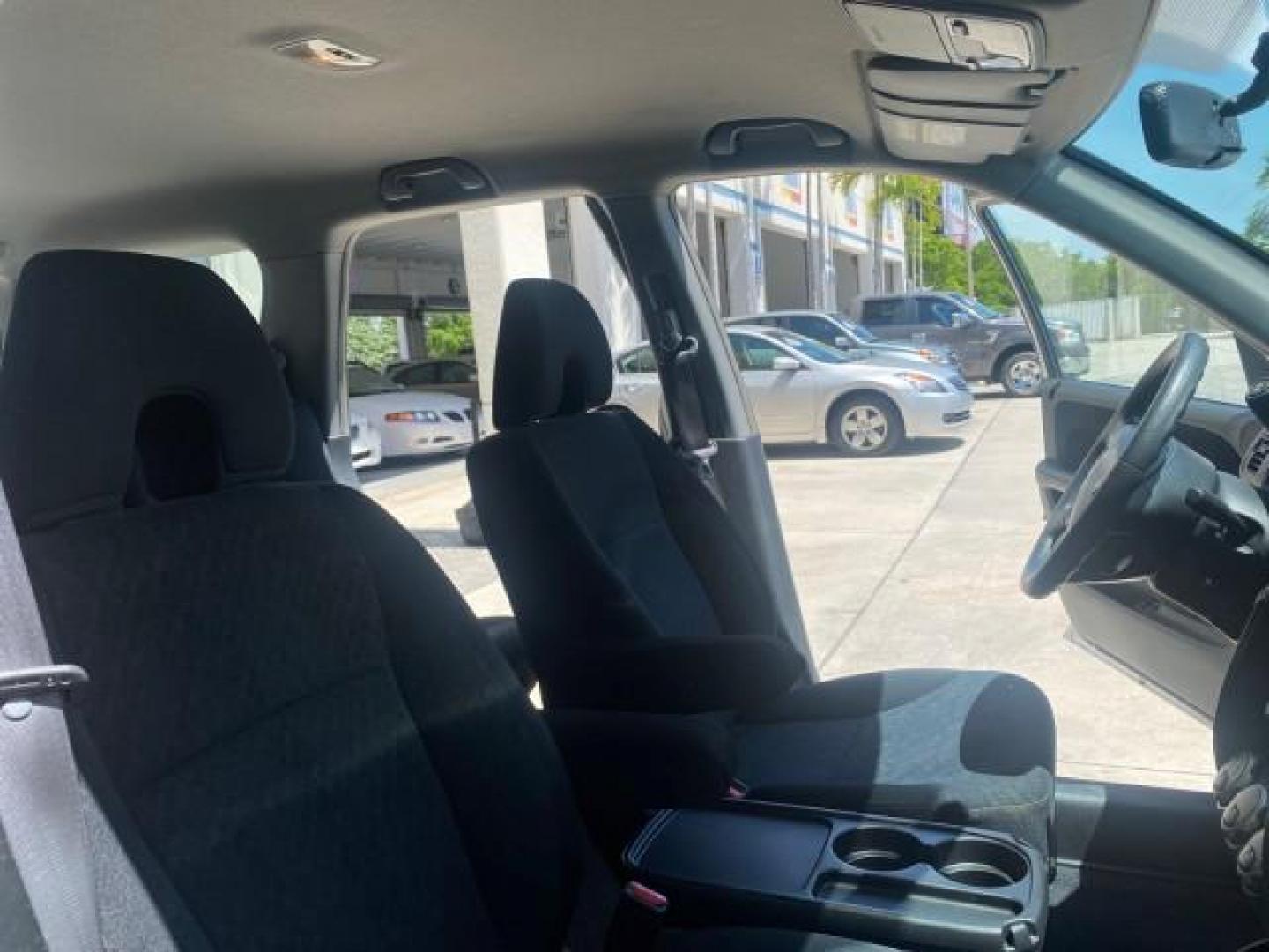 2005 Satin Silver Metallic /Black Honda CR-V AWD LX 1 OWNER LOW MILES 42,114 (SHSRD78595U) with an 2.4L DOHC MPFI 16-Valve i-VTEC I4 Engine engine, Automatic transmission, located at 4701 North Dixie Hwy, Pompano Beach, FL, 33064, (954) 422-2889, 26.240938, -80.123474 - OUR WEBPAGE FLORIDACARS1.COM HAS OVER 100 PHOTOS AND FREE CARFAX LINK 2005 HONDA CR-V LX VIN: SHSRD78595U324036 S H S R D 7 8 5 9 5 U 3 2 4 0 3 6 4 DOOR WAGON/SPORT UTILITY 2.4L I4 F DOHC GASOLINE ALL WHEEL DRIVE Top Features 4WD/AWD Cloth Seats Tow Hitch Basic Features ABS Brakes AM/FM Stereo Air C - Photo#12