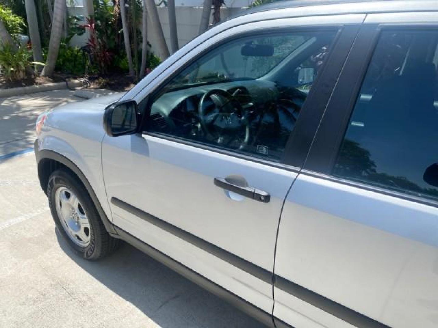 2005 Satin Silver Metallic /Black Honda CR-V AWD LX 1 OWNER LOW MILES 42,114 (SHSRD78595U) with an 2.4L DOHC MPFI 16-Valve i-VTEC I4 Engine engine, Automatic transmission, located at 4701 North Dixie Hwy, Pompano Beach, FL, 33064, (954) 422-2889, 26.240938, -80.123474 - OUR WEBPAGE FLORIDACARS1.COM HAS OVER 100 PHOTOS AND FREE CARFAX LINK 2005 HONDA CR-V LX VIN: SHSRD78595U324036 S H S R D 7 8 5 9 5 U 3 2 4 0 3 6 4 DOOR WAGON/SPORT UTILITY 2.4L I4 F DOHC GASOLINE ALL WHEEL DRIVE Top Features 4WD/AWD Cloth Seats Tow Hitch Basic Features ABS Brakes AM/FM Stereo Air C - Photo#27