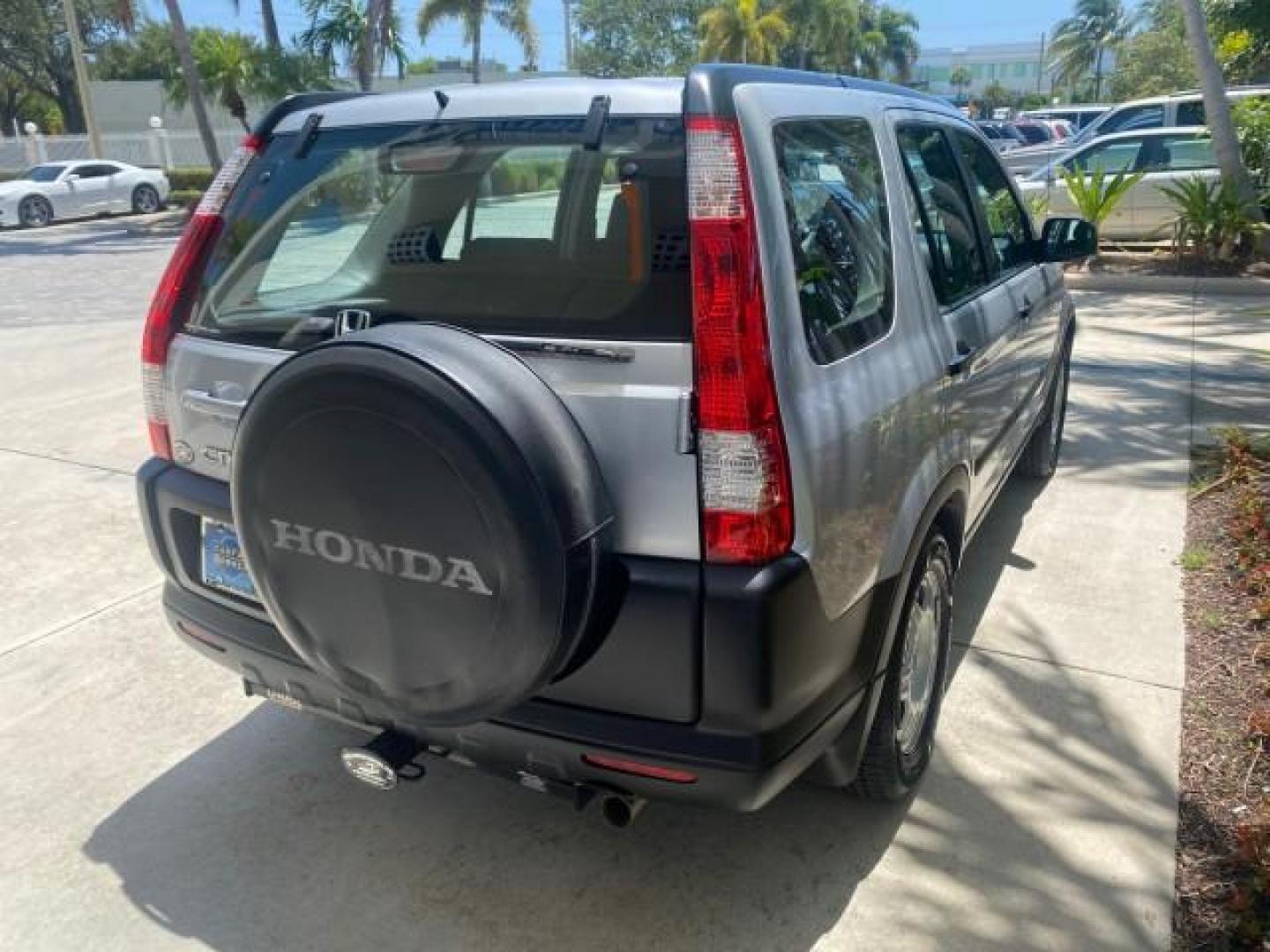 2005 Satin Silver Metallic /Black Honda CR-V AWD LX 1 OWNER LOW MILES 42,114 (SHSRD78595U) with an 2.4L DOHC MPFI 16-Valve i-VTEC I4 Engine engine, Automatic transmission, located at 4701 North Dixie Hwy, Pompano Beach, FL, 33064, (954) 422-2889, 26.240938, -80.123474 - OUR WEBPAGE FLORIDACARS1.COM HAS OVER 100 PHOTOS AND FREE CARFAX LINK 2005 HONDA CR-V LX VIN: SHSRD78595U324036 S H S R D 7 8 5 9 5 U 3 2 4 0 3 6 4 DOOR WAGON/SPORT UTILITY 2.4L I4 F DOHC GASOLINE ALL WHEEL DRIVE Top Features 4WD/AWD Cloth Seats Tow Hitch Basic Features ABS Brakes AM/FM Stereo Air C - Photo#85