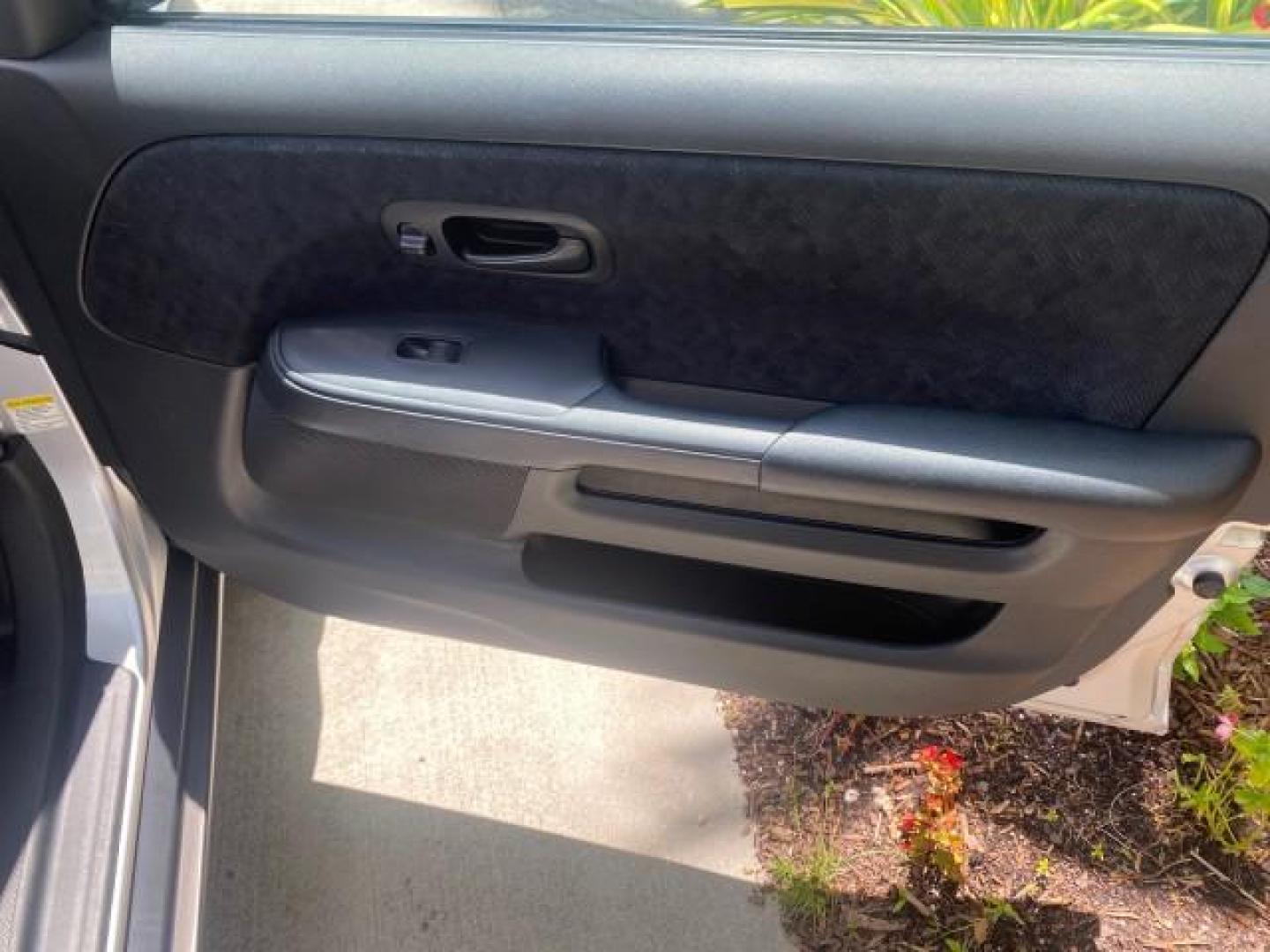 2005 Satin Silver Metallic /Black Honda CR-V AWD LX 1 OWNER LOW MILES 42,114 (SHSRD78595U) with an 2.4L DOHC MPFI 16-Valve i-VTEC I4 Engine engine, Automatic transmission, located at 4701 North Dixie Hwy, Pompano Beach, FL, 33064, (954) 422-2889, 26.240938, -80.123474 - OUR WEBPAGE FLORIDACARS1.COM HAS OVER 100 PHOTOS AND FREE CARFAX LINK 2005 HONDA CR-V LX VIN: SHSRD78595U324036 S H S R D 7 8 5 9 5 U 3 2 4 0 3 6 4 DOOR WAGON/SPORT UTILITY 2.4L I4 F DOHC GASOLINE ALL WHEEL DRIVE Top Features 4WD/AWD Cloth Seats Tow Hitch Basic Features ABS Brakes AM/FM Stereo Air C - Photo#98