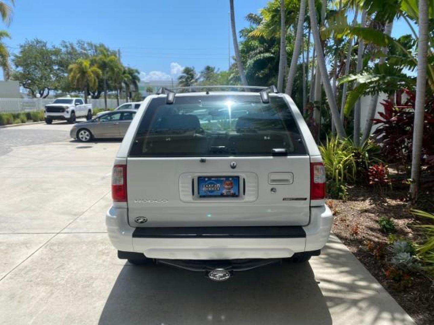 2001 Alpine White /Beige Isuzu Rodeo LSE LOW MILES 78,391 (4S2CK58W814) with an 3.2L DOHC MFI 24-Valve V6 Engine engine, Automatic transmission, located at 4701 North Dixie Hwy, Pompano Beach, FL, 33064, (954) 422-2889, 26.240938, -80.123474 - OUR WEBPAGE FLORIDACARS1.COM HAS OVER 100 PHOTOS AND FREE CARFAX LINK 2001 ISUZU RODEO LSE ROAD READY 3.2L V6 VIN: 4S2CK58W814310263 NO ACCIDENTS 4 DOOR WAGON/SPORT UTILITY NO RECALLS SUNROOF 3.2L DOHC V6 FLORIDA OWNER GASOLINE LOW MILES 78,876 REAR WHEEL DRIVE POWER LEATHER SEATS Approach Lights Cr - Photo#6