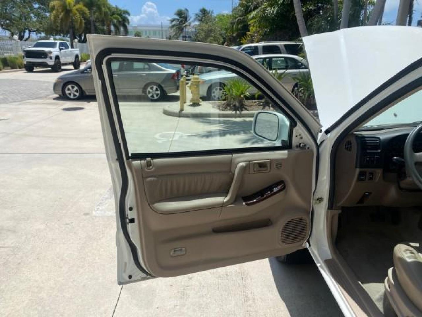 2001 Alpine White /Beige Isuzu Rodeo LSE LOW MILES 78,391 (4S2CK58W814) with an 3.2L DOHC MFI 24-Valve V6 Engine engine, Automatic transmission, located at 4701 North Dixie Hwy, Pompano Beach, FL, 33064, (954) 422-2889, 26.240938, -80.123474 - OUR WEBPAGE FLORIDACARS1.COM HAS OVER 100 PHOTOS AND FREE CARFAX LINK 2001 ISUZU RODEO LSE ROAD READY 3.2L V6 VIN: 4S2CK58W814310263 NO ACCIDENTS 4 DOOR WAGON/SPORT UTILITY NO RECALLS SUNROOF 3.2L DOHC V6 FLORIDA OWNER GASOLINE LOW MILES 78,876 REAR WHEEL DRIVE POWER LEATHER SEATS Approach Lights Cr - Photo#9