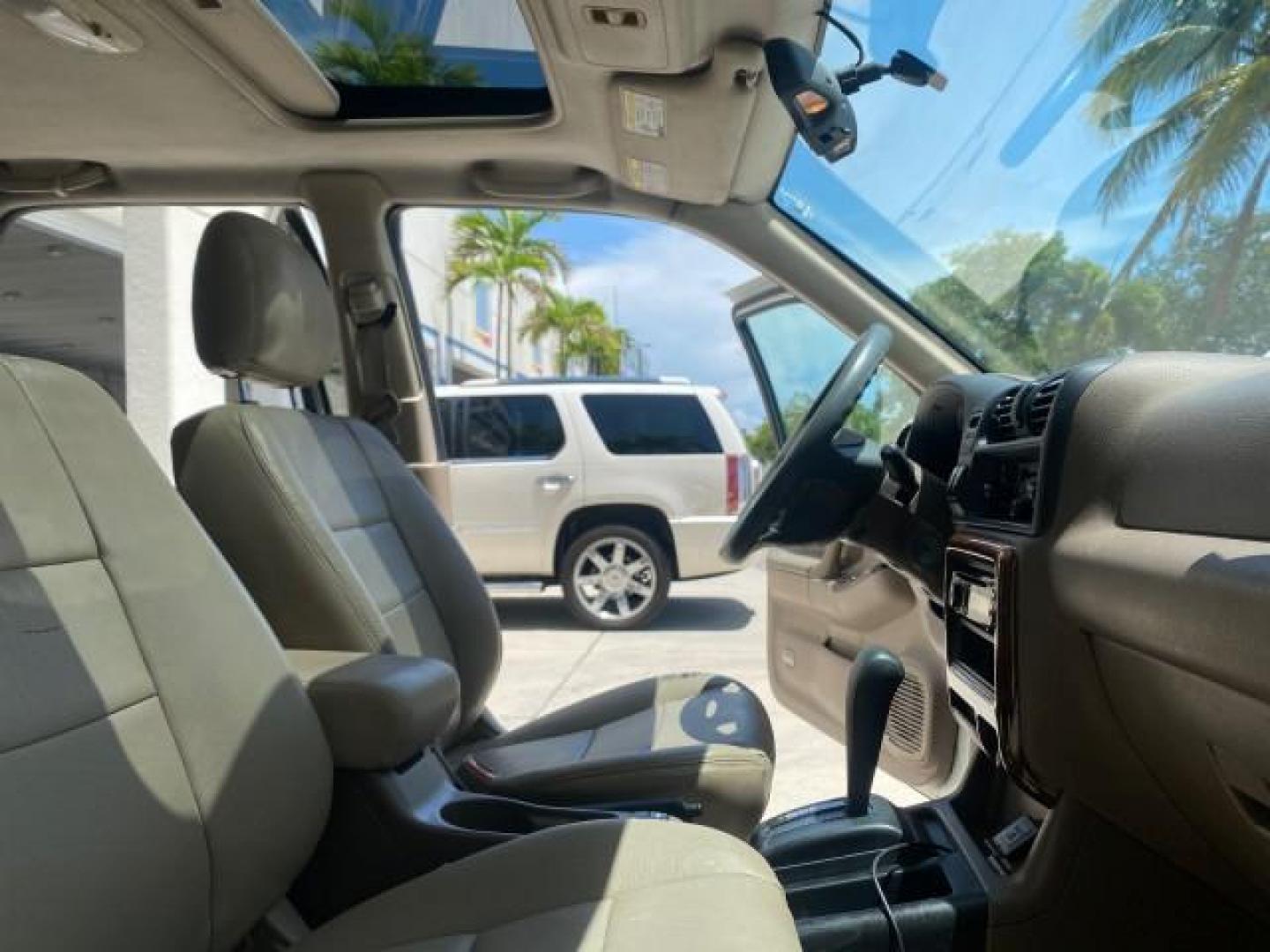 2001 Alpine White /Beige Isuzu Rodeo LSE LOW MILES 78,391 (4S2CK58W814) with an 3.2L DOHC MFI 24-Valve V6 Engine engine, Automatic transmission, located at 4701 North Dixie Hwy, Pompano Beach, FL, 33064, (954) 422-2889, 26.240938, -80.123474 - OUR WEBPAGE FLORIDACARS1.COM HAS OVER 100 PHOTOS AND FREE CARFAX LINK 2001 ISUZU RODEO LSE ROAD READY 3.2L V6 VIN: 4S2CK58W814310263 NO ACCIDENTS 4 DOOR WAGON/SPORT UTILITY NO RECALLS SUNROOF 3.2L DOHC V6 FLORIDA OWNER GASOLINE LOW MILES 78,876 REAR WHEEL DRIVE POWER LEATHER SEATS Approach Lights Cr - Photo#12