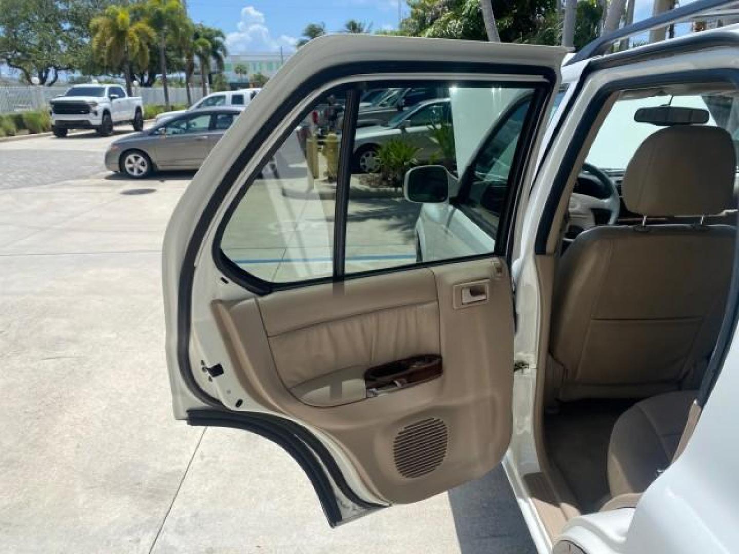 2001 Alpine White /Beige Isuzu Rodeo LSE LOW MILES 78,391 (4S2CK58W814) with an 3.2L DOHC MFI 24-Valve V6 Engine engine, Automatic transmission, located at 4701 North Dixie Hwy, Pompano Beach, FL, 33064, (954) 422-2889, 26.240938, -80.123474 - OUR WEBPAGE FLORIDACARS1.COM HAS OVER 100 PHOTOS AND FREE CARFAX LINK 2001 ISUZU RODEO LSE ROAD READY 3.2L V6 VIN: 4S2CK58W814310263 NO ACCIDENTS 4 DOOR WAGON/SPORT UTILITY NO RECALLS SUNROOF 3.2L DOHC V6 FLORIDA OWNER GASOLINE LOW MILES 78,876 REAR WHEEL DRIVE POWER LEATHER SEATS Approach Lights Cr - Photo#13