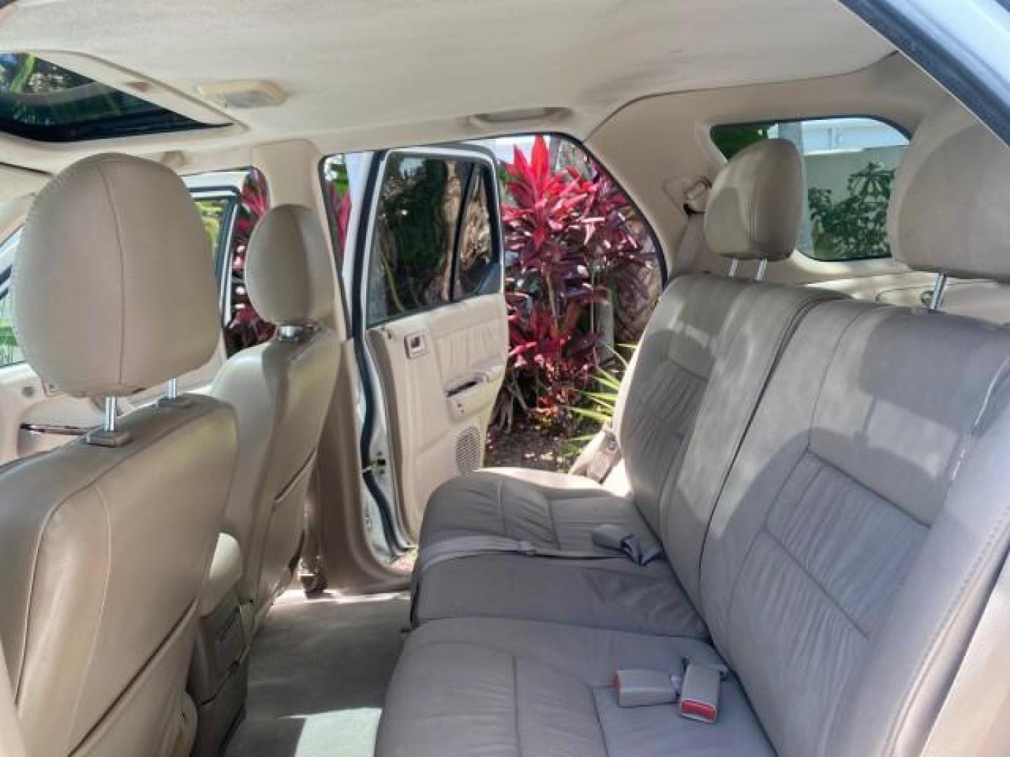 2001 Alpine White /Beige Isuzu Rodeo LSE LOW MILES 78,391 (4S2CK58W814) with an 3.2L DOHC MFI 24-Valve V6 Engine engine, Automatic transmission, located at 4701 North Dixie Hwy, Pompano Beach, FL, 33064, (954) 422-2889, 26.240938, -80.123474 - OUR WEBPAGE FLORIDACARS1.COM HAS OVER 100 PHOTOS AND FREE CARFAX LINK 2001 ISUZU RODEO LSE ROAD READY 3.2L V6 VIN: 4S2CK58W814310263 NO ACCIDENTS 4 DOOR WAGON/SPORT UTILITY NO RECALLS SUNROOF 3.2L DOHC V6 FLORIDA OWNER GASOLINE LOW MILES 78,876 REAR WHEEL DRIVE POWER LEATHER SEATS Approach Lights Cr - Photo#14