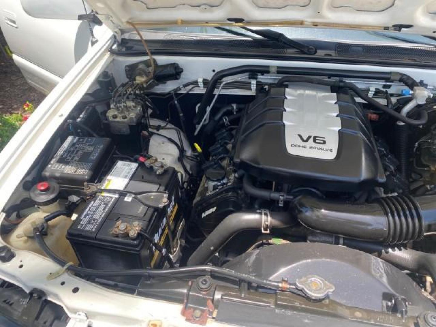 2001 Alpine White /Beige Isuzu Rodeo LSE LOW MILES 78,391 (4S2CK58W814) with an 3.2L DOHC MFI 24-Valve V6 Engine engine, Automatic transmission, located at 4701 North Dixie Hwy, Pompano Beach, FL, 33064, (954) 422-2889, 26.240938, -80.123474 - OUR WEBPAGE FLORIDACARS1.COM HAS OVER 100 PHOTOS AND FREE CARFAX LINK 2001 ISUZU RODEO LSE ROAD READY 3.2L V6 VIN: 4S2CK58W814310263 NO ACCIDENTS 4 DOOR WAGON/SPORT UTILITY NO RECALLS SUNROOF 3.2L DOHC V6 FLORIDA OWNER GASOLINE LOW MILES 78,876 REAR WHEEL DRIVE POWER LEATHER SEATS Approach Lights Cr - Photo#18