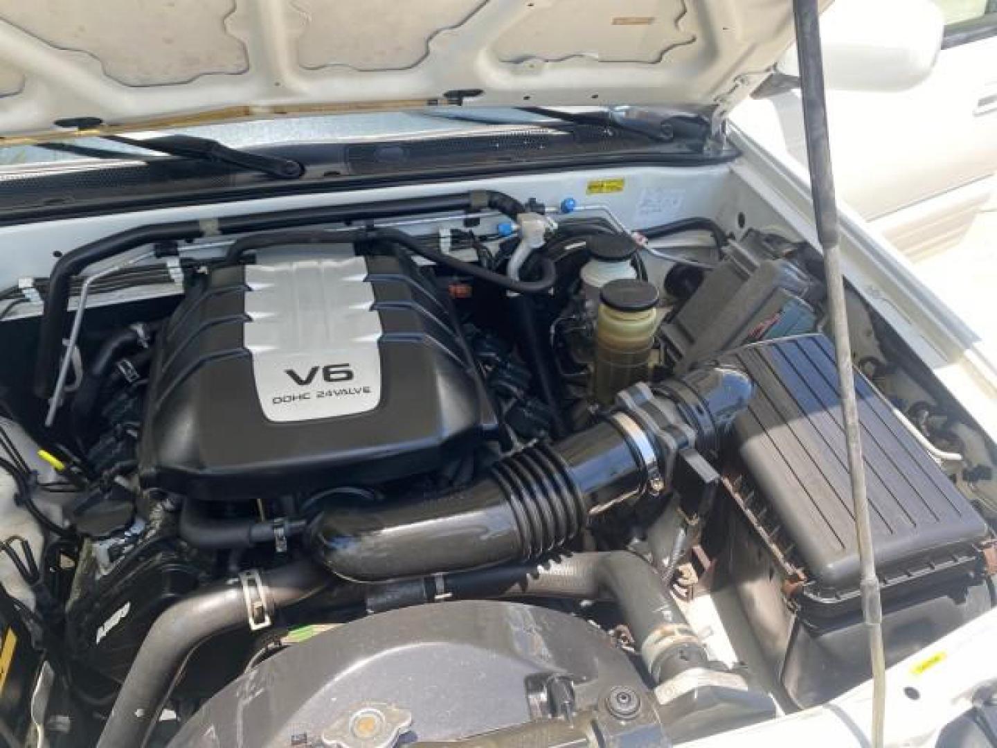 2001 Alpine White /Beige Isuzu Rodeo LSE LOW MILES 78,391 (4S2CK58W814) with an 3.2L DOHC MFI 24-Valve V6 Engine engine, Automatic transmission, located at 4701 North Dixie Hwy, Pompano Beach, FL, 33064, (954) 422-2889, 26.240938, -80.123474 - OUR WEBPAGE FLORIDACARS1.COM HAS OVER 100 PHOTOS AND FREE CARFAX LINK 2001 ISUZU RODEO LSE ROAD READY 3.2L V6 VIN: 4S2CK58W814310263 NO ACCIDENTS 4 DOOR WAGON/SPORT UTILITY NO RECALLS SUNROOF 3.2L DOHC V6 FLORIDA OWNER GASOLINE LOW MILES 78,876 REAR WHEEL DRIVE POWER LEATHER SEATS Approach Lights Cr - Photo#19
