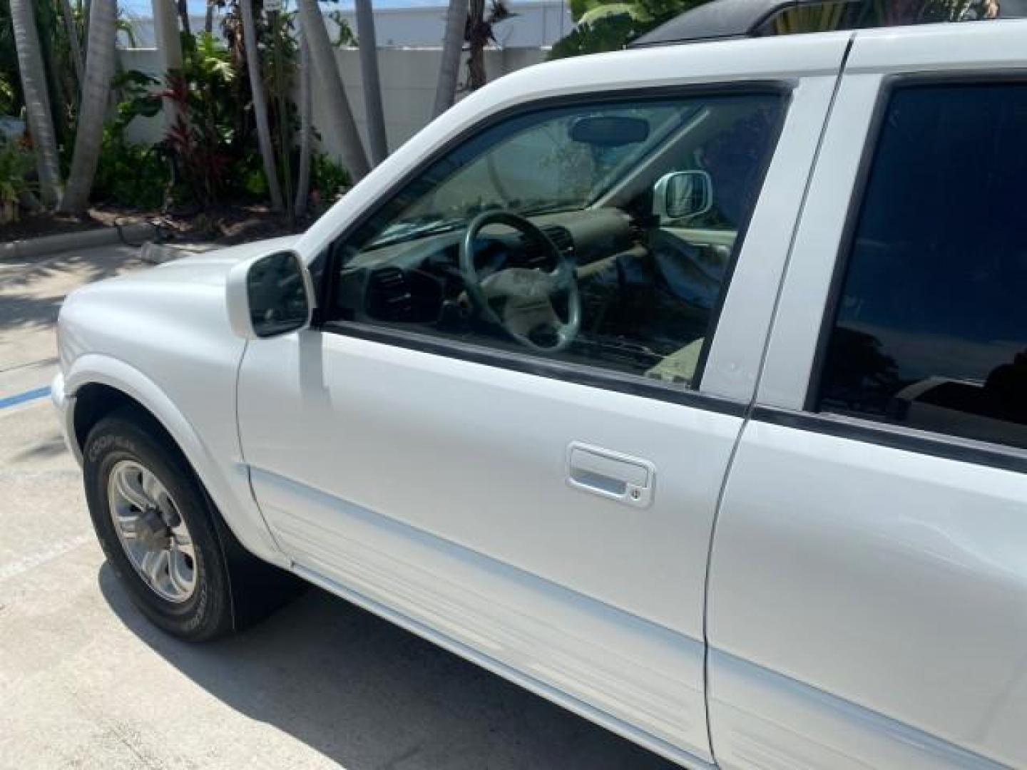 2001 Alpine White /Beige Isuzu Rodeo LSE LOW MILES 78,391 (4S2CK58W814) with an 3.2L DOHC MFI 24-Valve V6 Engine engine, Automatic transmission, located at 4701 North Dixie Hwy, Pompano Beach, FL, 33064, (954) 422-2889, 26.240938, -80.123474 - OUR WEBPAGE FLORIDACARS1.COM HAS OVER 100 PHOTOS AND FREE CARFAX LINK 2001 ISUZU RODEO LSE ROAD READY 3.2L V6 VIN: 4S2CK58W814310263 NO ACCIDENTS 4 DOOR WAGON/SPORT UTILITY NO RECALLS SUNROOF 3.2L DOHC V6 FLORIDA OWNER GASOLINE LOW MILES 78,876 REAR WHEEL DRIVE POWER LEATHER SEATS Approach Lights Cr - Photo#25