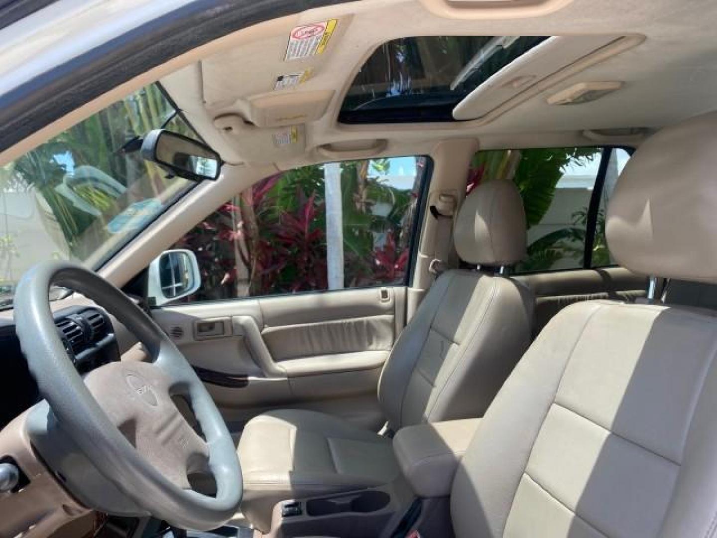 2001 Alpine White /Beige Isuzu Rodeo LSE LOW MILES 78,391 (4S2CK58W814) with an 3.2L DOHC MFI 24-Valve V6 Engine engine, Automatic transmission, located at 4701 North Dixie Hwy, Pompano Beach, FL, 33064, (954) 422-2889, 26.240938, -80.123474 - OUR WEBPAGE FLORIDACARS1.COM HAS OVER 100 PHOTOS AND FREE CARFAX LINK 2001 ISUZU RODEO LSE ROAD READY 3.2L V6 VIN: 4S2CK58W814310263 NO ACCIDENTS 4 DOOR WAGON/SPORT UTILITY NO RECALLS SUNROOF 3.2L DOHC V6 FLORIDA OWNER GASOLINE LOW MILES 78,876 REAR WHEEL DRIVE POWER LEATHER SEATS Approach Lights Cr - Photo#31