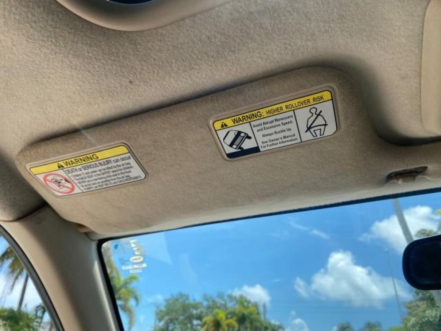 2001 Alpine White /Beige Isuzu Rodeo LSE LOW MILES 78,391 (4S2CK58W814) with an 3.2L DOHC MFI 24-Valve V6 Engine engine, Automatic transmission, located at 4701 North Dixie Hwy, Pompano Beach, FL, 33064, (954) 422-2889, 26.240938, -80.123474 - OUR WEBPAGE FLORIDACARS1.COM HAS OVER 100 PHOTOS AND FREE CARFAX LINK 2001 ISUZU RODEO LSE ROAD READY 3.2L V6 VIN: 4S2CK58W814310263 NO ACCIDENTS 4 DOOR WAGON/SPORT UTILITY NO RECALLS SUNROOF 3.2L DOHC V6 FLORIDA OWNER GASOLINE LOW MILES 78,876 REAR WHEEL DRIVE POWER LEATHER SEATS Approach Lights Cr - Photo#56