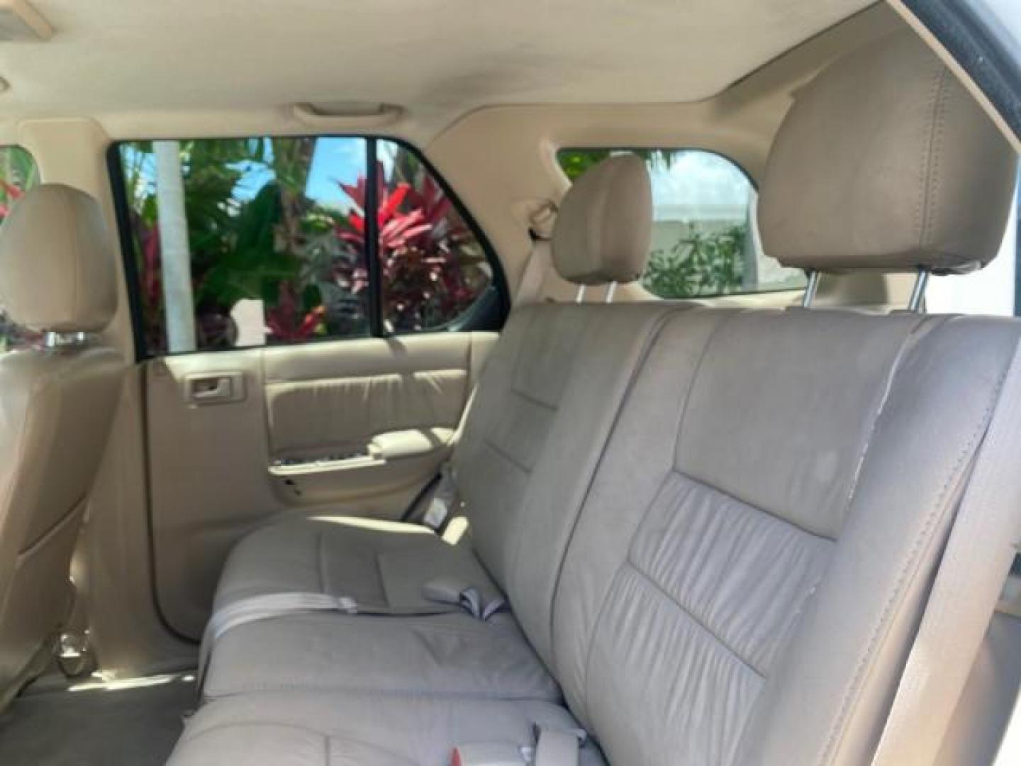 2001 Alpine White /Beige Isuzu Rodeo LSE LOW MILES 78,391 (4S2CK58W814) with an 3.2L DOHC MFI 24-Valve V6 Engine engine, Automatic transmission, located at 4701 North Dixie Hwy, Pompano Beach, FL, 33064, (954) 422-2889, 26.240938, -80.123474 - OUR WEBPAGE FLORIDACARS1.COM HAS OVER 100 PHOTOS AND FREE CARFAX LINK 2001 ISUZU RODEO LSE ROAD READY 3.2L V6 VIN: 4S2CK58W814310263 NO ACCIDENTS 4 DOOR WAGON/SPORT UTILITY NO RECALLS SUNROOF 3.2L DOHC V6 FLORIDA OWNER GASOLINE LOW MILES 78,876 REAR WHEEL DRIVE POWER LEATHER SEATS Approach Lights Cr - Photo#63