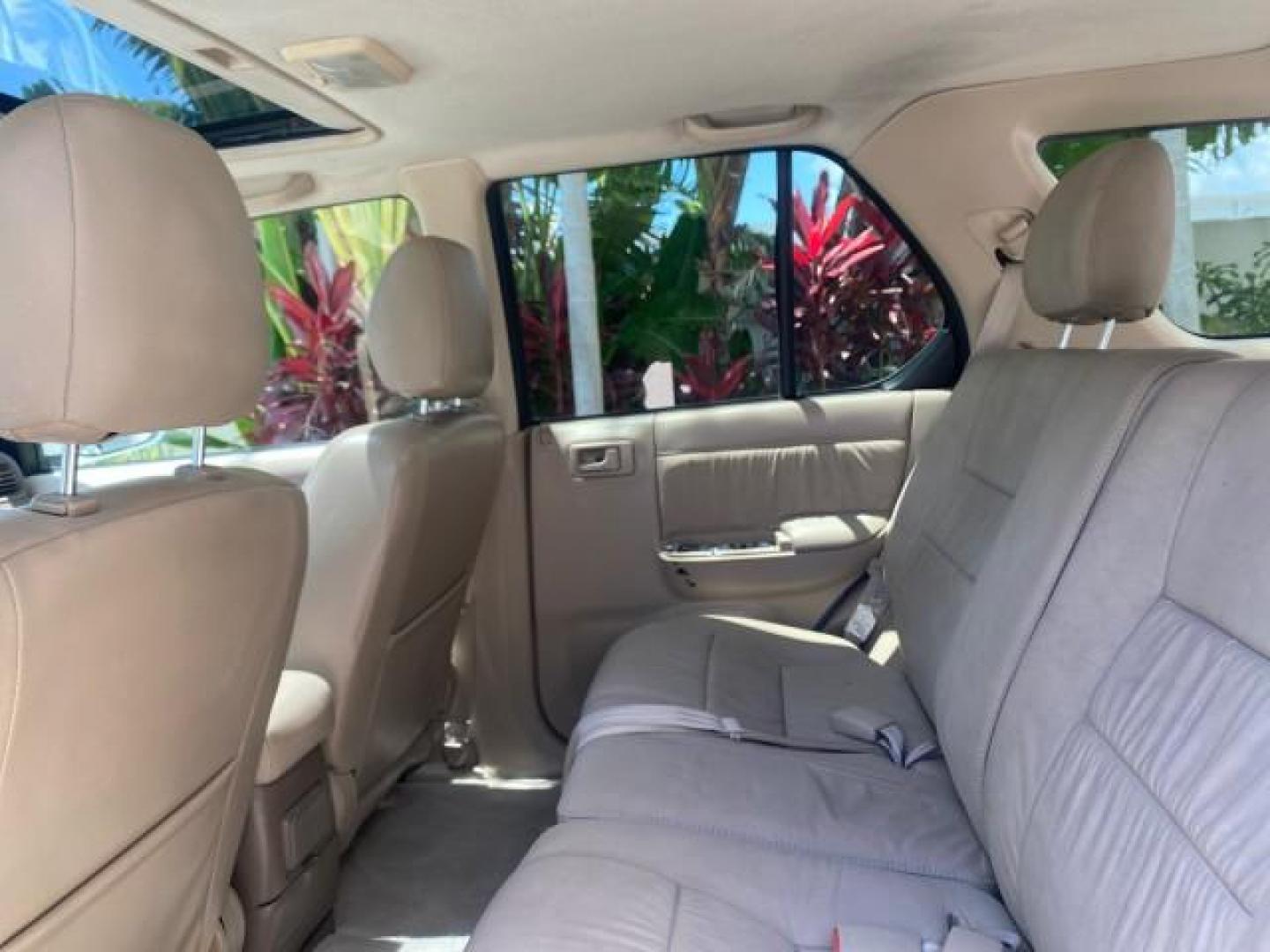 2001 Alpine White /Beige Isuzu Rodeo LSE LOW MILES 78,391 (4S2CK58W814) with an 3.2L DOHC MFI 24-Valve V6 Engine engine, Automatic transmission, located at 4701 North Dixie Hwy, Pompano Beach, FL, 33064, (954) 422-2889, 26.240938, -80.123474 - OUR WEBPAGE FLORIDACARS1.COM HAS OVER 100 PHOTOS AND FREE CARFAX LINK 2001 ISUZU RODEO LSE ROAD READY 3.2L V6 VIN: 4S2CK58W814310263 NO ACCIDENTS 4 DOOR WAGON/SPORT UTILITY NO RECALLS SUNROOF 3.2L DOHC V6 FLORIDA OWNER GASOLINE LOW MILES 78,876 REAR WHEEL DRIVE POWER LEATHER SEATS Approach Lights Cr - Photo#65