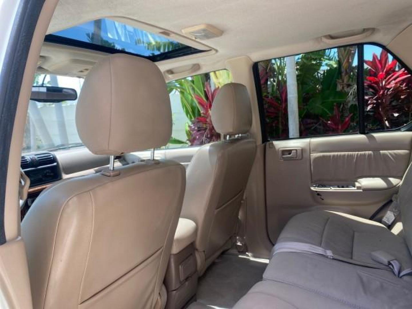 2001 Alpine White /Beige Isuzu Rodeo LSE LOW MILES 78,391 (4S2CK58W814) with an 3.2L DOHC MFI 24-Valve V6 Engine engine, Automatic transmission, located at 4701 North Dixie Hwy, Pompano Beach, FL, 33064, (954) 422-2889, 26.240938, -80.123474 - OUR WEBPAGE FLORIDACARS1.COM HAS OVER 100 PHOTOS AND FREE CARFAX LINK 2001 ISUZU RODEO LSE ROAD READY 3.2L V6 VIN: 4S2CK58W814310263 NO ACCIDENTS 4 DOOR WAGON/SPORT UTILITY NO RECALLS SUNROOF 3.2L DOHC V6 FLORIDA OWNER GASOLINE LOW MILES 78,876 REAR WHEEL DRIVE POWER LEATHER SEATS Approach Lights Cr - Photo#66