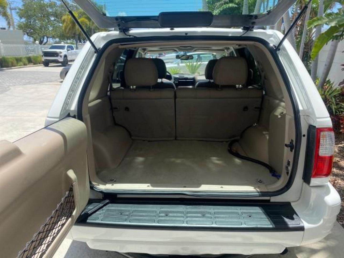 2001 Alpine White /Beige Isuzu Rodeo LSE LOW MILES 78,391 (4S2CK58W814) with an 3.2L DOHC MFI 24-Valve V6 Engine engine, Automatic transmission, located at 4701 North Dixie Hwy, Pompano Beach, FL, 33064, (954) 422-2889, 26.240938, -80.123474 - OUR WEBPAGE FLORIDACARS1.COM HAS OVER 100 PHOTOS AND FREE CARFAX LINK 2001 ISUZU RODEO LSE ROAD READY 3.2L V6 VIN: 4S2CK58W814310263 NO ACCIDENTS 4 DOOR WAGON/SPORT UTILITY NO RECALLS SUNROOF 3.2L DOHC V6 FLORIDA OWNER GASOLINE LOW MILES 78,876 REAR WHEEL DRIVE POWER LEATHER SEATS Approach Lights Cr - Photo#78
