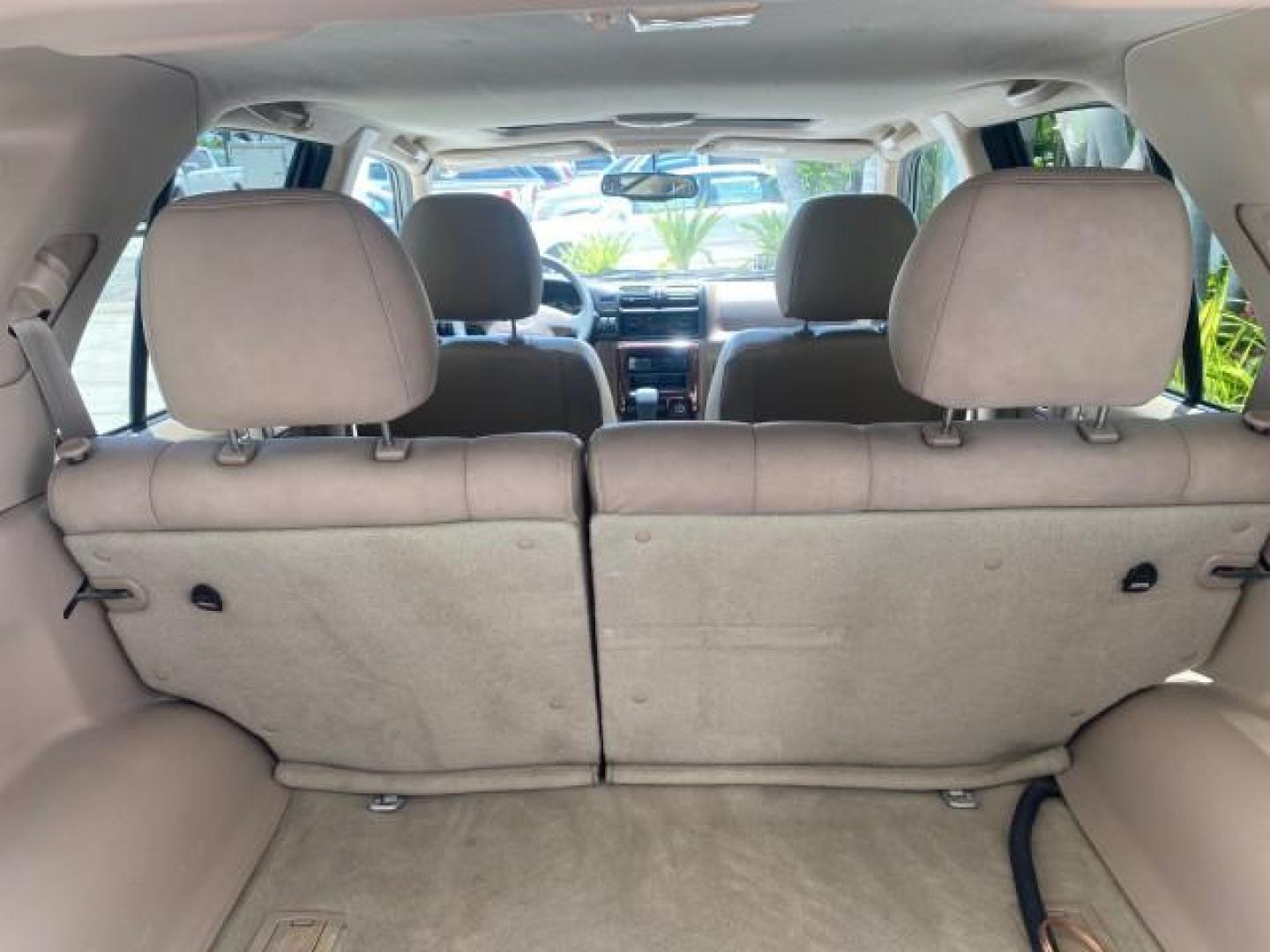 2001 Alpine White /Beige Isuzu Rodeo LSE LOW MILES 78,391 (4S2CK58W814) with an 3.2L DOHC MFI 24-Valve V6 Engine engine, Automatic transmission, located at 4701 North Dixie Hwy, Pompano Beach, FL, 33064, (954) 422-2889, 26.240938, -80.123474 - OUR WEBPAGE FLORIDACARS1.COM HAS OVER 100 PHOTOS AND FREE CARFAX LINK 2001 ISUZU RODEO LSE ROAD READY 3.2L V6 VIN: 4S2CK58W814310263 NO ACCIDENTS 4 DOOR WAGON/SPORT UTILITY NO RECALLS SUNROOF 3.2L DOHC V6 FLORIDA OWNER GASOLINE LOW MILES 78,876 REAR WHEEL DRIVE POWER LEATHER SEATS Approach Lights Cr - Photo#79
