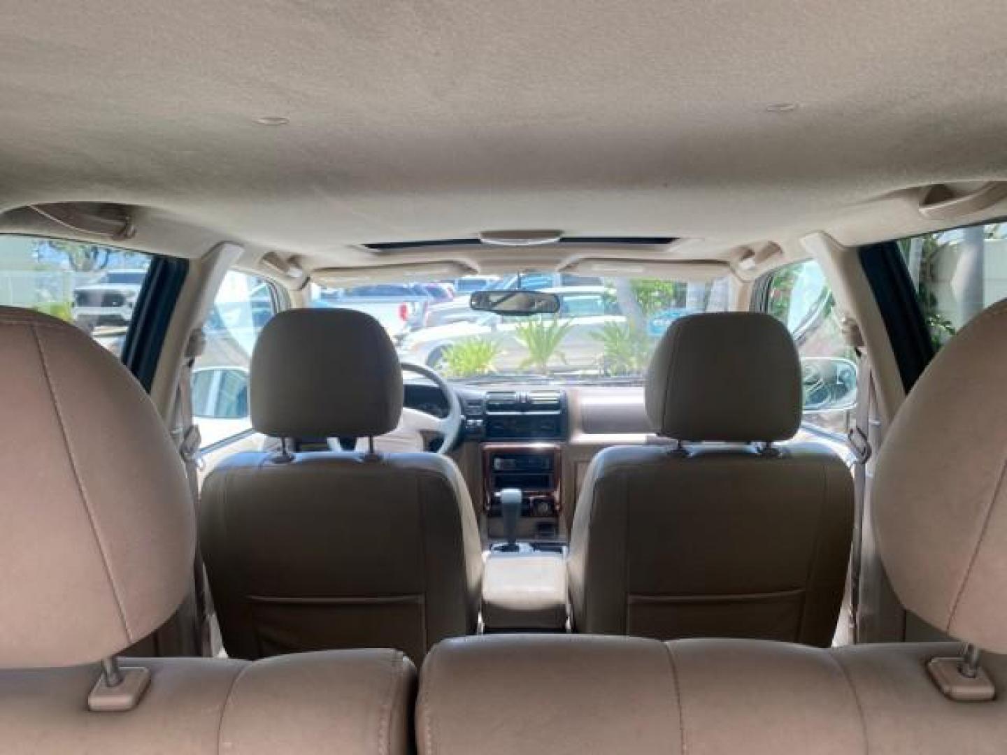 2001 Alpine White /Beige Isuzu Rodeo LSE LOW MILES 78,391 (4S2CK58W814) with an 3.2L DOHC MFI 24-Valve V6 Engine engine, Automatic transmission, located at 4701 North Dixie Hwy, Pompano Beach, FL, 33064, (954) 422-2889, 26.240938, -80.123474 - OUR WEBPAGE FLORIDACARS1.COM HAS OVER 100 PHOTOS AND FREE CARFAX LINK 2001 ISUZU RODEO LSE ROAD READY 3.2L V6 VIN: 4S2CK58W814310263 NO ACCIDENTS 4 DOOR WAGON/SPORT UTILITY NO RECALLS SUNROOF 3.2L DOHC V6 FLORIDA OWNER GASOLINE LOW MILES 78,876 REAR WHEEL DRIVE POWER LEATHER SEATS Approach Lights Cr - Photo#80