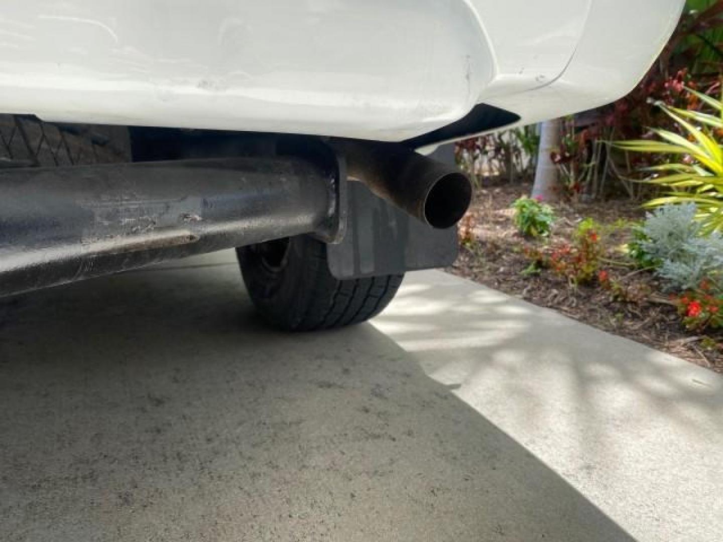 2001 Alpine White /Beige Isuzu Rodeo LSE LOW MILES 78,391 (4S2CK58W814) with an 3.2L DOHC MFI 24-Valve V6 Engine engine, Automatic transmission, located at 4701 North Dixie Hwy, Pompano Beach, FL, 33064, (954) 422-2889, 26.240938, -80.123474 - OUR WEBPAGE FLORIDACARS1.COM HAS OVER 100 PHOTOS AND FREE CARFAX LINK 2001 ISUZU RODEO LSE ROAD READY 3.2L V6 VIN: 4S2CK58W814310263 NO ACCIDENTS 4 DOOR WAGON/SPORT UTILITY NO RECALLS SUNROOF 3.2L DOHC V6 FLORIDA OWNER GASOLINE LOW MILES 78,876 REAR WHEEL DRIVE POWER LEATHER SEATS Approach Lights Cr - Photo#85