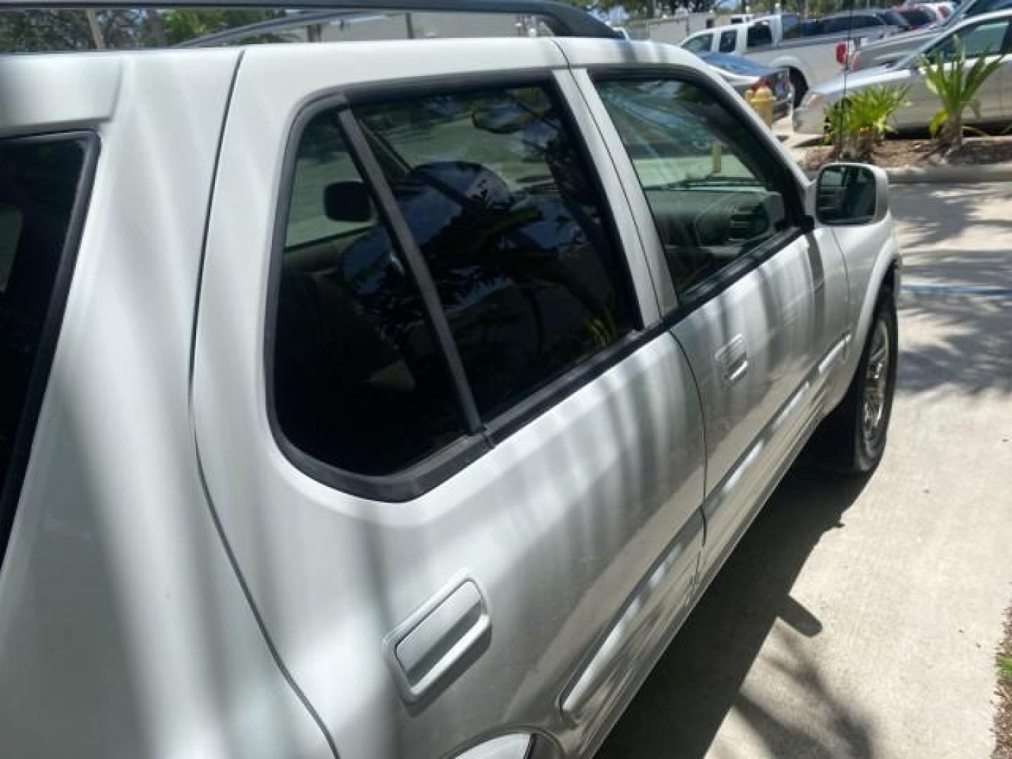 2001 Alpine White /Beige Isuzu Rodeo LSE LOW MILES 78,391 (4S2CK58W814) with an 3.2L DOHC MFI 24-Valve V6 Engine engine, Automatic transmission, located at 4701 North Dixie Hwy, Pompano Beach, FL, 33064, (954) 422-2889, 26.240938, -80.123474 - OUR WEBPAGE FLORIDACARS1.COM HAS OVER 100 PHOTOS AND FREE CARFAX LINK 2001 ISUZU RODEO LSE ROAD READY 3.2L V6 VIN: 4S2CK58W814310263 NO ACCIDENTS 4 DOOR WAGON/SPORT UTILITY NO RECALLS SUNROOF 3.2L DOHC V6 FLORIDA OWNER GASOLINE LOW MILES 78,876 REAR WHEEL DRIVE POWER LEATHER SEATS Approach Lights Cr - Photo#90