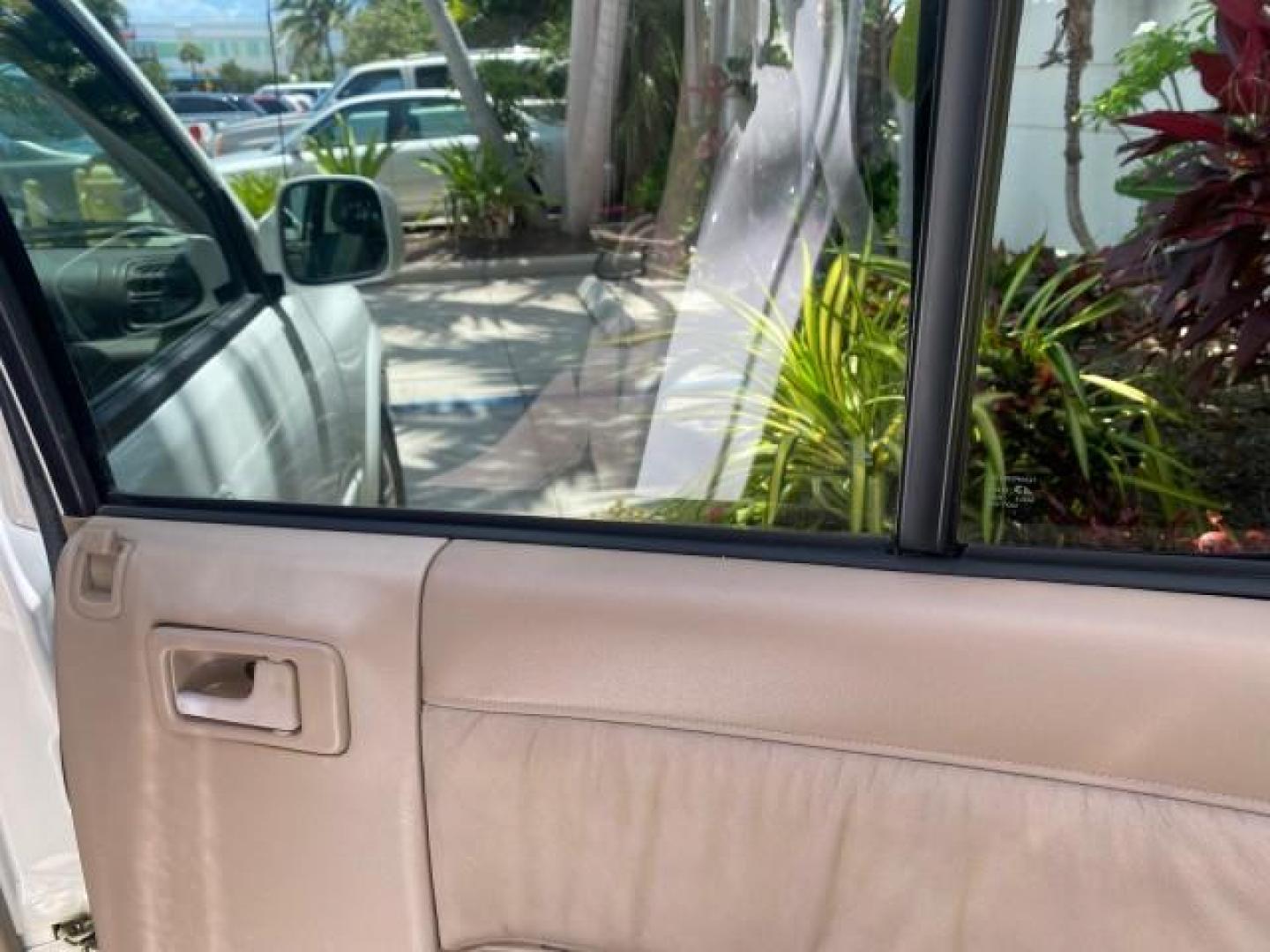 2001 Alpine White /Beige Isuzu Rodeo LSE LOW MILES 78,391 (4S2CK58W814) with an 3.2L DOHC MFI 24-Valve V6 Engine engine, Automatic transmission, located at 4701 North Dixie Hwy, Pompano Beach, FL, 33064, (954) 422-2889, 26.240938, -80.123474 - OUR WEBPAGE FLORIDACARS1.COM HAS OVER 100 PHOTOS AND FREE CARFAX LINK 2001 ISUZU RODEO LSE ROAD READY 3.2L V6 VIN: 4S2CK58W814310263 NO ACCIDENTS 4 DOOR WAGON/SPORT UTILITY NO RECALLS SUNROOF 3.2L DOHC V6 FLORIDA OWNER GASOLINE LOW MILES 78,876 REAR WHEEL DRIVE POWER LEATHER SEATS Approach Lights Cr - Photo#92