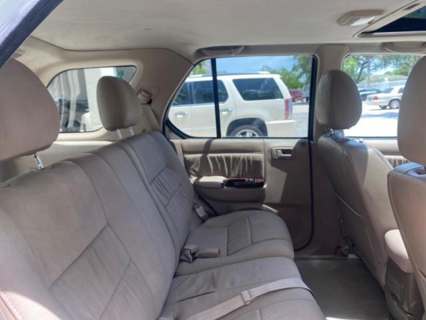 2001 Alpine White /Beige Isuzu Rodeo LSE LOW MILES 78,391 (4S2CK58W814) with an 3.2L DOHC MFI 24-Valve V6 Engine engine, Automatic transmission, located at 4701 North Dixie Hwy, Pompano Beach, FL, 33064, (954) 422-2889, 26.240938, -80.123474 - OUR WEBPAGE FLORIDACARS1.COM HAS OVER 100 PHOTOS AND FREE CARFAX LINK 2001 ISUZU RODEO LSE ROAD READY 3.2L V6 VIN: 4S2CK58W814310263 NO ACCIDENTS 4 DOOR WAGON/SPORT UTILITY NO RECALLS SUNROOF 3.2L DOHC V6 FLORIDA OWNER GASOLINE LOW MILES 78,876 REAR WHEEL DRIVE POWER LEATHER SEATS Approach Lights Cr - Photo#93