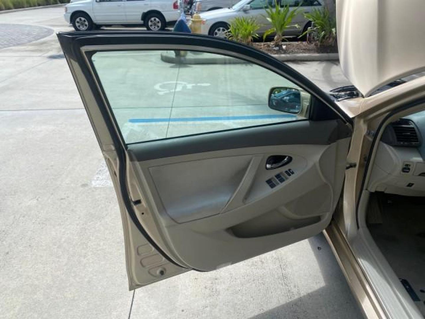 2010 Sandy Beach Metallic /Bisque Toyota Camry LE 1 OWNER LOW MILES 27,079 (4T1BF3EK1AU) with an 2.5L 4-Cyl Engine engine, Automatic transmission, located at 4701 North Dixie Hwy, Pompano Beach, FL, 33064, (954) 422-2889, 26.240938, -80.123474 - OUR WEBPAGE FLORIDACARS1.COM HAS OVER 100 PHOTOS AND FREE CARFAX LINK 2010 TOYOTA CAMRY LE WE WILL ADD NEW TIRES! VIN: 4T1BF3EK1AU533077 4 T 1 B F 3 E K 1 A U 5 3 3 0 7 7 SEDAN 4 DR 2.5L I4 F DOHC 16V 32 MPG GASOLINE FRONT WHEEL DRIVE Top Features Cloth Seats Basic Features ABS Brakes Auxiliary Audi - Photo#9