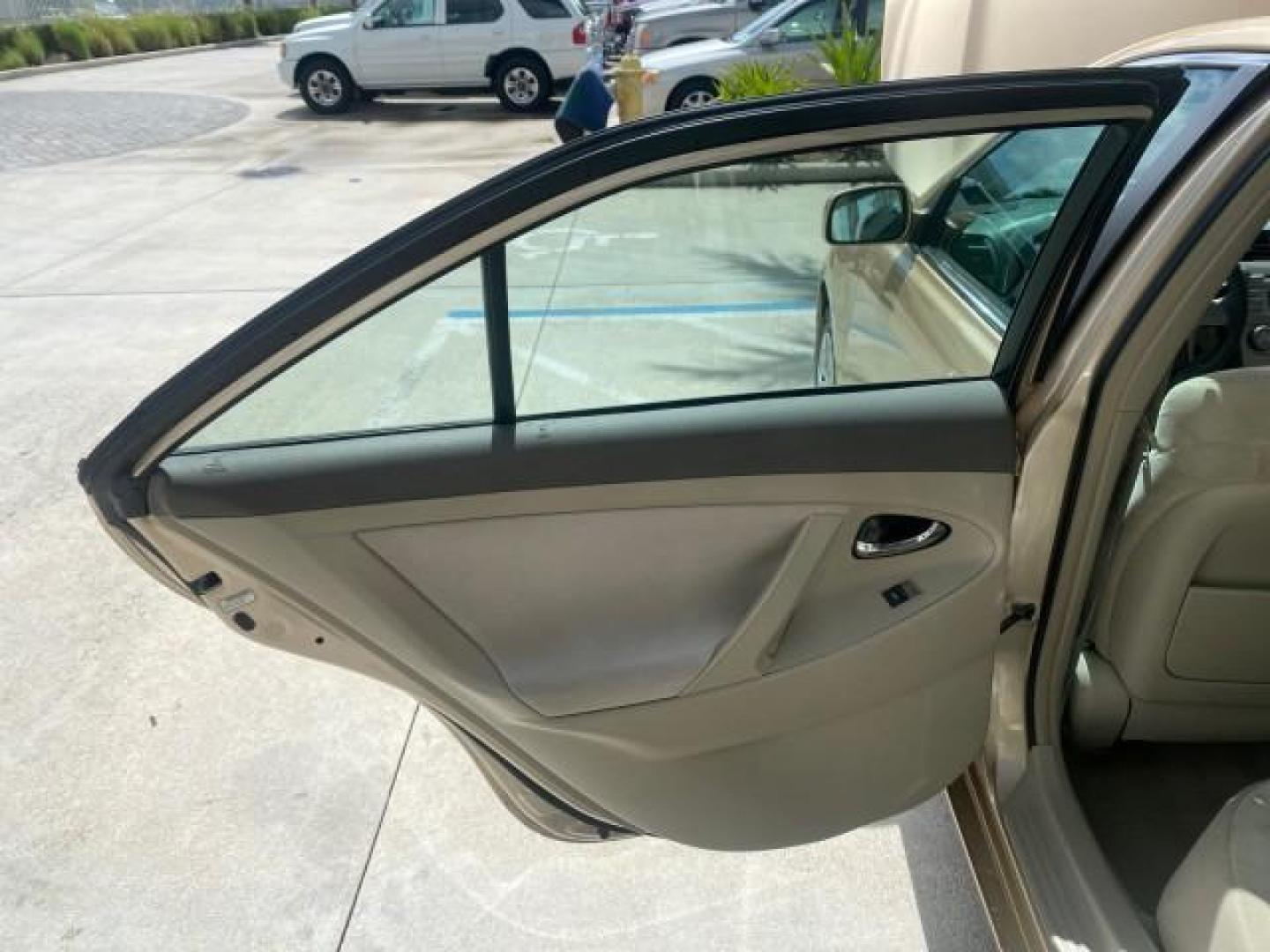 2010 Sandy Beach Metallic /Bisque Toyota Camry LE 1 OWNER LOW MILES 27,079 (4T1BF3EK1AU) with an 2.5L 4-Cyl Engine engine, Automatic transmission, located at 4701 North Dixie Hwy, Pompano Beach, FL, 33064, (954) 422-2889, 26.240938, -80.123474 - OUR WEBPAGE FLORIDACARS1.COM HAS OVER 100 PHOTOS AND FREE CARFAX LINK 2010 TOYOTA CAMRY LE WE WILL ADD NEW TIRES! VIN: 4T1BF3EK1AU533077 4 T 1 B F 3 E K 1 A U 5 3 3 0 7 7 SEDAN 4 DR 2.5L I4 F DOHC 16V 32 MPG GASOLINE FRONT WHEEL DRIVE Top Features Cloth Seats Basic Features ABS Brakes Auxiliary Audi - Photo#13