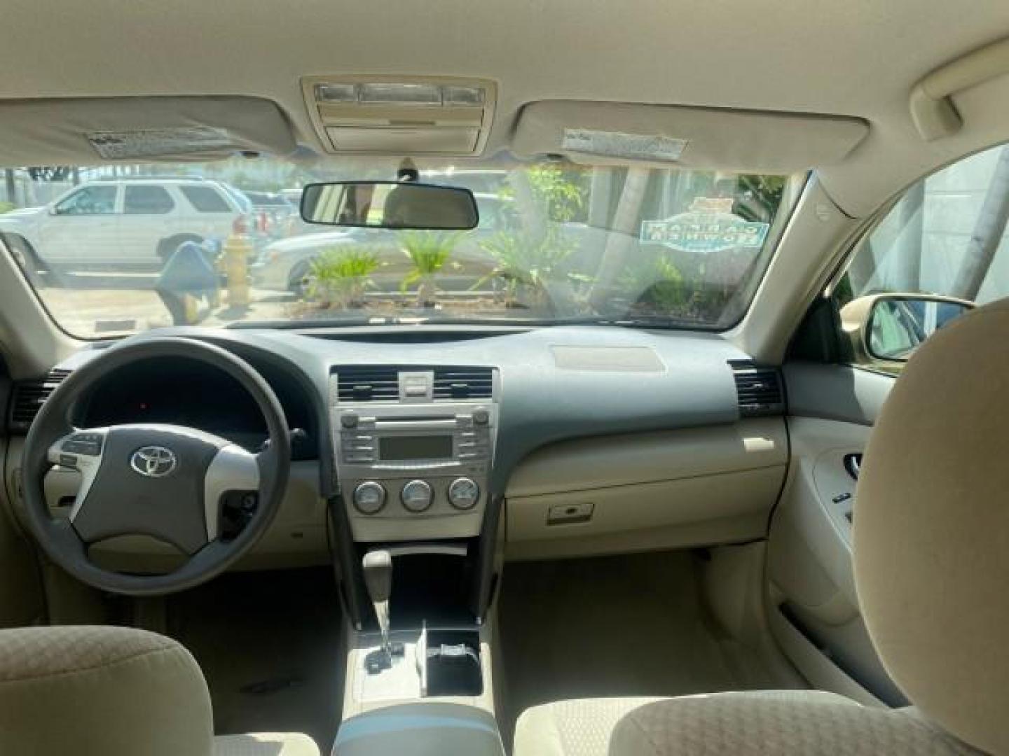 2010 Sandy Beach Metallic /Bisque Toyota Camry LE 1 OWNER LOW MILES 27,079 (4T1BF3EK1AU) with an 2.5L 4-Cyl Engine engine, Automatic transmission, located at 4701 North Dixie Hwy, Pompano Beach, FL, 33064, (954) 422-2889, 26.240938, -80.123474 - OUR WEBPAGE FLORIDACARS1.COM HAS OVER 100 PHOTOS AND FREE CARFAX LINK 2010 TOYOTA CAMRY LE WE WILL ADD NEW TIRES! VIN: 4T1BF3EK1AU533077 4 T 1 B F 3 E K 1 A U 5 3 3 0 7 7 SEDAN 4 DR 2.5L I4 F DOHC 16V 32 MPG GASOLINE FRONT WHEEL DRIVE Top Features Cloth Seats Basic Features ABS Brakes Auxiliary Audi - Photo#64