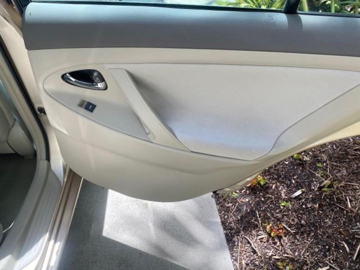 2010 Sandy Beach Metallic /Bisque Toyota Camry LE 1 OWNER LOW MILES 27,079 (4T1BF3EK1AU) with an 2.5L 4-Cyl Engine engine, Automatic transmission, located at 4701 North Dixie Hwy, Pompano Beach, FL, 33064, (954) 422-2889, 26.240938, -80.123474 - OUR WEBPAGE FLORIDACARS1.COM HAS OVER 100 PHOTOS AND FREE CARFAX LINK 2010 TOYOTA CAMRY LE WE WILL ADD NEW TIRES! VIN: 4T1BF3EK1AU533077 4 T 1 B F 3 E K 1 A U 5 3 3 0 7 7 SEDAN 4 DR 2.5L I4 F DOHC 16V 32 MPG GASOLINE FRONT WHEEL DRIVE Top Features Cloth Seats Basic Features ABS Brakes Auxiliary Audi - Photo#82