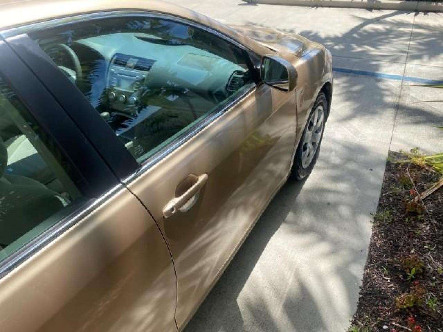 2010 Sandy Beach Metallic /Bisque Toyota Camry LE 1 OWNER LOW MILES 27,079 (4T1BF3EK1AU) with an 2.5L 4-Cyl Engine engine, Automatic transmission, located at 4701 North Dixie Hwy, Pompano Beach, FL, 33064, (954) 422-2889, 26.240938, -80.123474 - OUR WEBPAGE FLORIDACARS1.COM HAS OVER 100 PHOTOS AND FREE CARFAX LINK 2010 TOYOTA CAMRY LE WE WILL ADD NEW TIRES! VIN: 4T1BF3EK1AU533077 4 T 1 B F 3 E K 1 A U 5 3 3 0 7 7 SEDAN 4 DR 2.5L I4 F DOHC 16V 32 MPG GASOLINE FRONT WHEEL DRIVE Top Features Cloth Seats Basic Features ABS Brakes Auxiliary Audi - Photo#89