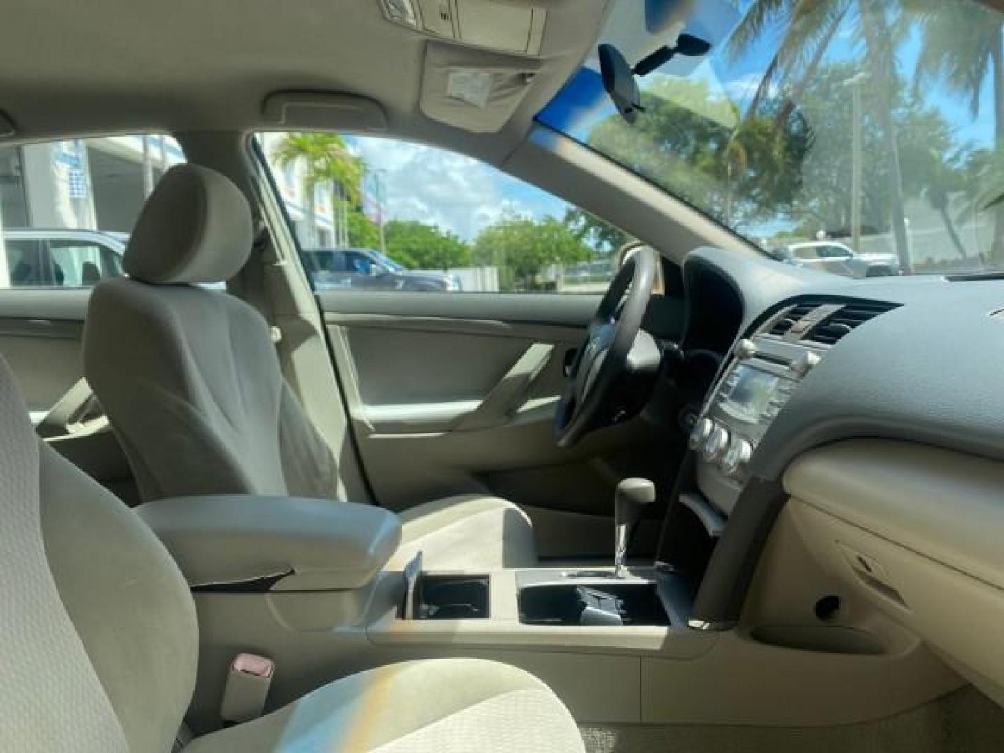 2010 Sandy Beach Metallic /Bisque Toyota Camry LE 1 OWNER LOW MILES 27,079 (4T1BF3EK1AU) with an 2.5L 4-Cyl Engine engine, Automatic transmission, located at 4701 North Dixie Hwy, Pompano Beach, FL, 33064, (954) 422-2889, 26.240938, -80.123474 - OUR WEBPAGE FLORIDACARS1.COM HAS OVER 100 PHOTOS AND FREE CARFAX LINK 2010 TOYOTA CAMRY LE WE WILL ADD NEW TIRES! VIN: 4T1BF3EK1AU533077 4 T 1 B F 3 E K 1 A U 5 3 3 0 7 7 SEDAN 4 DR 2.5L I4 F DOHC 16V 32 MPG GASOLINE FRONT WHEEL DRIVE Top Features Cloth Seats Basic Features ABS Brakes Auxiliary Audi - Photo#94
