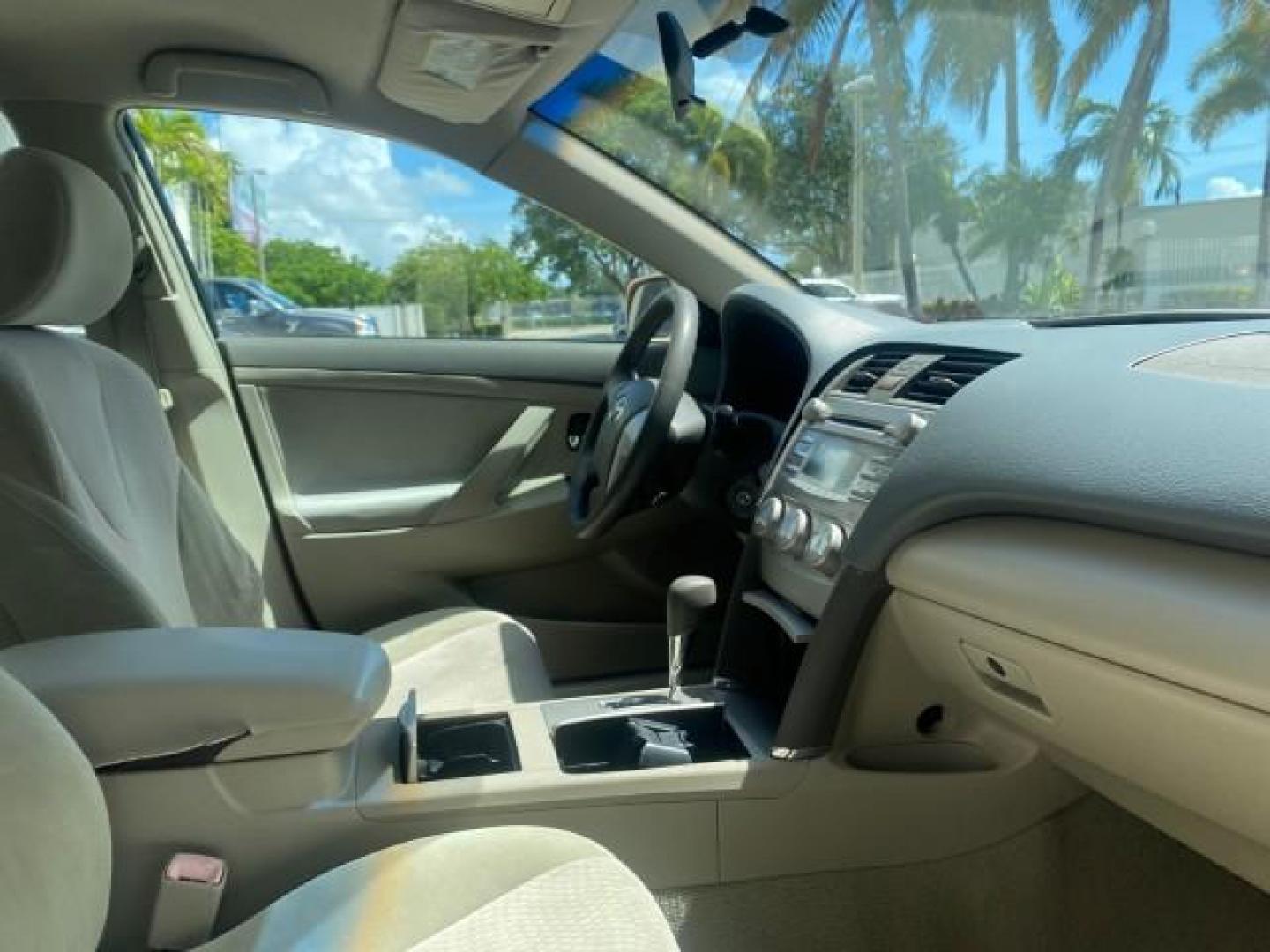 2010 Sandy Beach Metallic /Bisque Toyota Camry LE 1 OWNER LOW MILES 27,079 (4T1BF3EK1AU) with an 2.5L 4-Cyl Engine engine, Automatic transmission, located at 4701 North Dixie Hwy, Pompano Beach, FL, 33064, (954) 422-2889, 26.240938, -80.123474 - OUR WEBPAGE FLORIDACARS1.COM HAS OVER 100 PHOTOS AND FREE CARFAX LINK 2010 TOYOTA CAMRY LE WE WILL ADD NEW TIRES! VIN: 4T1BF3EK1AU533077 4 T 1 B F 3 E K 1 A U 5 3 3 0 7 7 SEDAN 4 DR 2.5L I4 F DOHC 16V 32 MPG GASOLINE FRONT WHEEL DRIVE Top Features Cloth Seats Basic Features ABS Brakes Auxiliary Audi - Photo#95