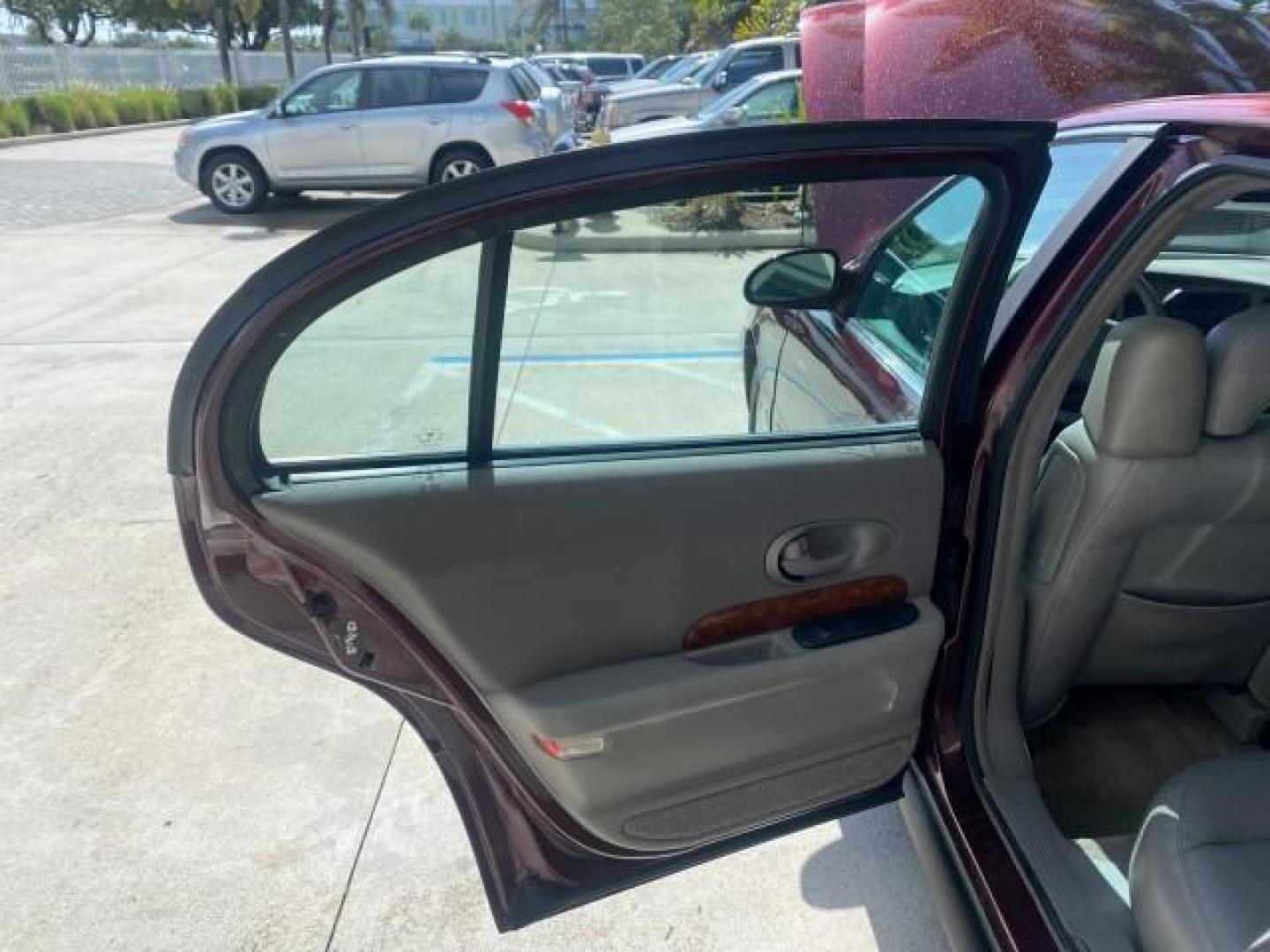2003 Cabernet Red Metallic /Medium Gray Buick LeSabre Limited 1 OWNER FL LOW MILES 72,247 (1G4HR54KX3U) with an 3.8L 3800 V6 SFI Engine engine, Automatic transmission, located at 4701 North Dixie Hwy, Pompano Beach, FL, 33064, (954) 422-2889, 26.240938, -80.123474 - OUR WEBPAGE FLORIDACARS1.COM HAS OVER 100 PHOTOS AND FREE CARFAX LINK 2003 BUICK LESABRE LIMITED $ 31,795 NEW VIN: 1G4HR54KX3U187919 1 G 4 H R 5 4 K X 3 U 1 8 7 9 1 9 SEDAN 4 DR 3.8L V6 F 12V GASOLINE 29 MPG FRONT WHEEL DRIVE Top Features Alloy Wheels Front Seat Heaters Leather Seats Rear Seat Heate - Photo#13