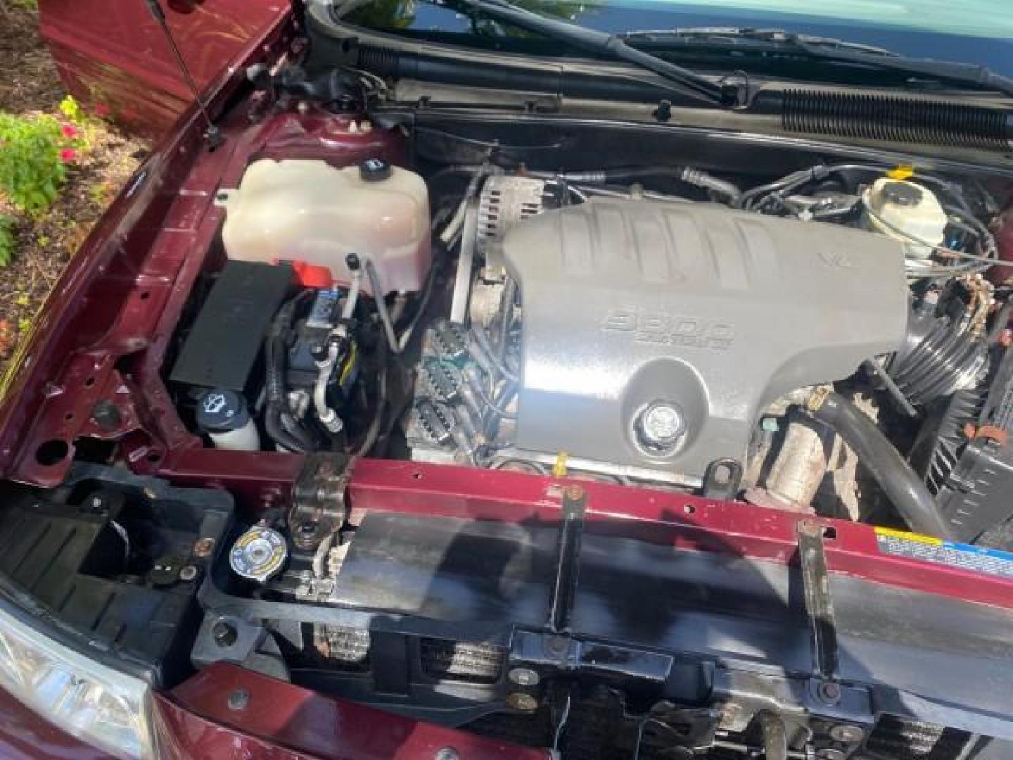 2003 Cabernet Red Metallic /Medium Gray Buick LeSabre Limited 1 OWNER FL LOW MILES 72,247 (1G4HR54KX3U) with an 3.8L 3800 V6 SFI Engine engine, Automatic transmission, located at 4701 North Dixie Hwy, Pompano Beach, FL, 33064, (954) 422-2889, 26.240938, -80.123474 - OUR WEBPAGE FLORIDACARS1.COM HAS OVER 100 PHOTOS AND FREE CARFAX LINK 2003 BUICK LESABRE LIMITED $ 31,795 NEW VIN: 1G4HR54KX3U187919 1 G 4 H R 5 4 K X 3 U 1 8 7 9 1 9 SEDAN 4 DR 3.8L V6 F 12V GASOLINE 29 MPG FRONT WHEEL DRIVE Top Features Alloy Wheels Front Seat Heaters Leather Seats Rear Seat Heate - Photo#25