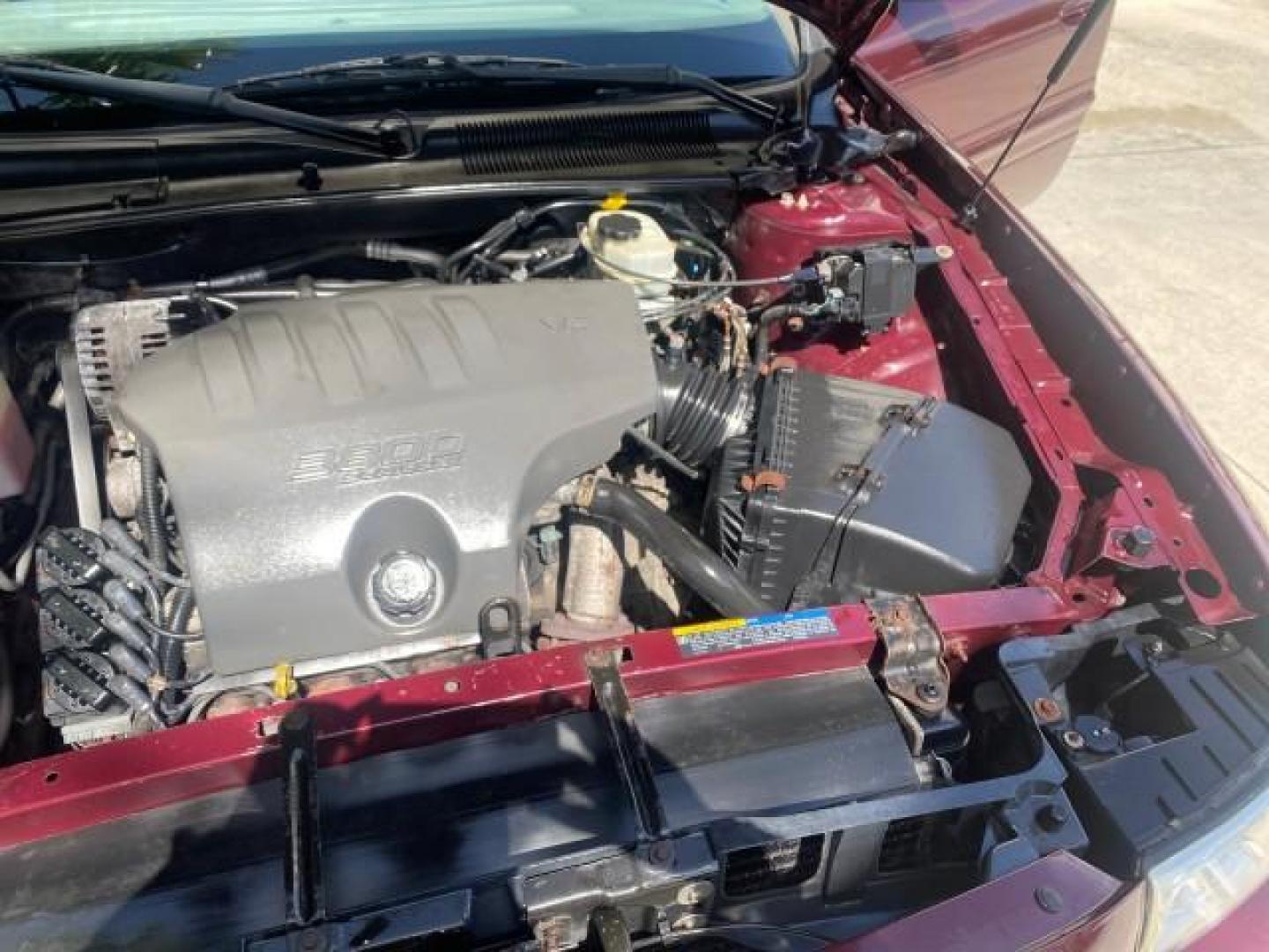 2003 Cabernet Red Metallic /Medium Gray Buick LeSabre Limited 1 OWNER FL LOW MILES 72,247 (1G4HR54KX3U) with an 3.8L 3800 V6 SFI Engine engine, Automatic transmission, located at 4701 North Dixie Hwy, Pompano Beach, FL, 33064, (954) 422-2889, 26.240938, -80.123474 - OUR WEBPAGE FLORIDACARS1.COM HAS OVER 100 PHOTOS AND FREE CARFAX LINK 2003 BUICK LESABRE LIMITED $ 31,795 NEW VIN: 1G4HR54KX3U187919 1 G 4 H R 5 4 K X 3 U 1 8 7 9 1 9 SEDAN 4 DR 3.8L V6 F 12V GASOLINE 29 MPG FRONT WHEEL DRIVE Top Features Alloy Wheels Front Seat Heaters Leather Seats Rear Seat Heate - Photo#26